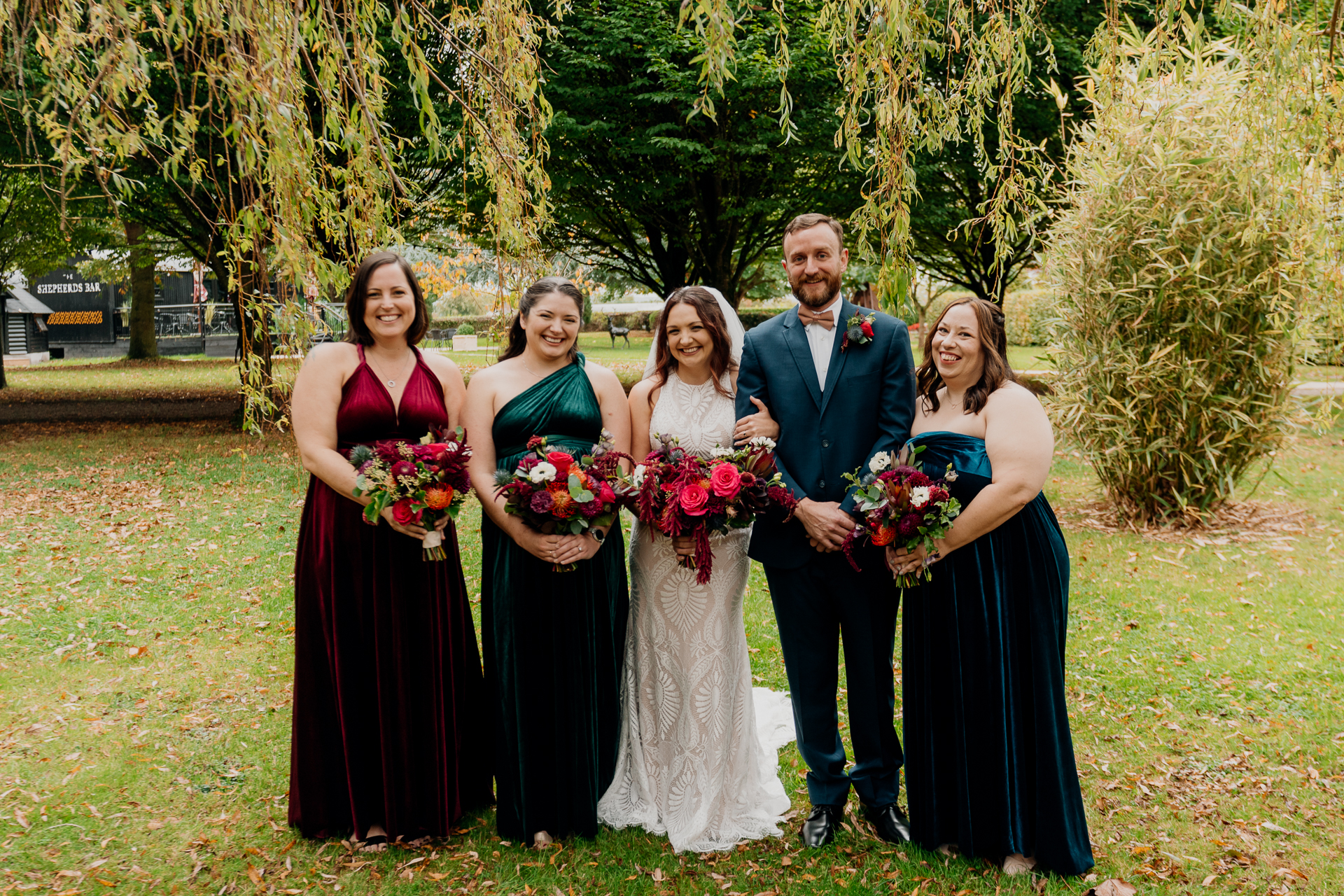 Bridesmaids enjoying a moment in the garden of Barberstown Castle.