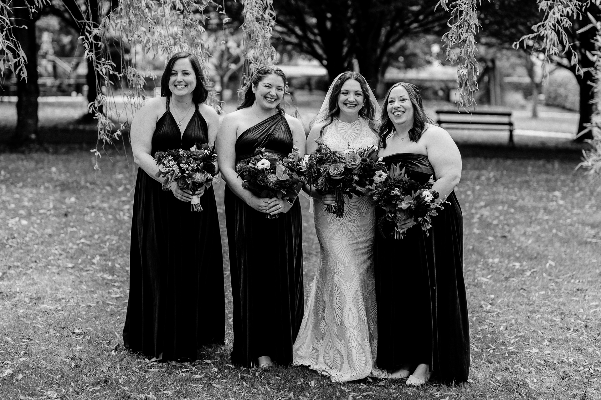 Bridesmaids enjoying a moment in the garden of Barberstown Castle.