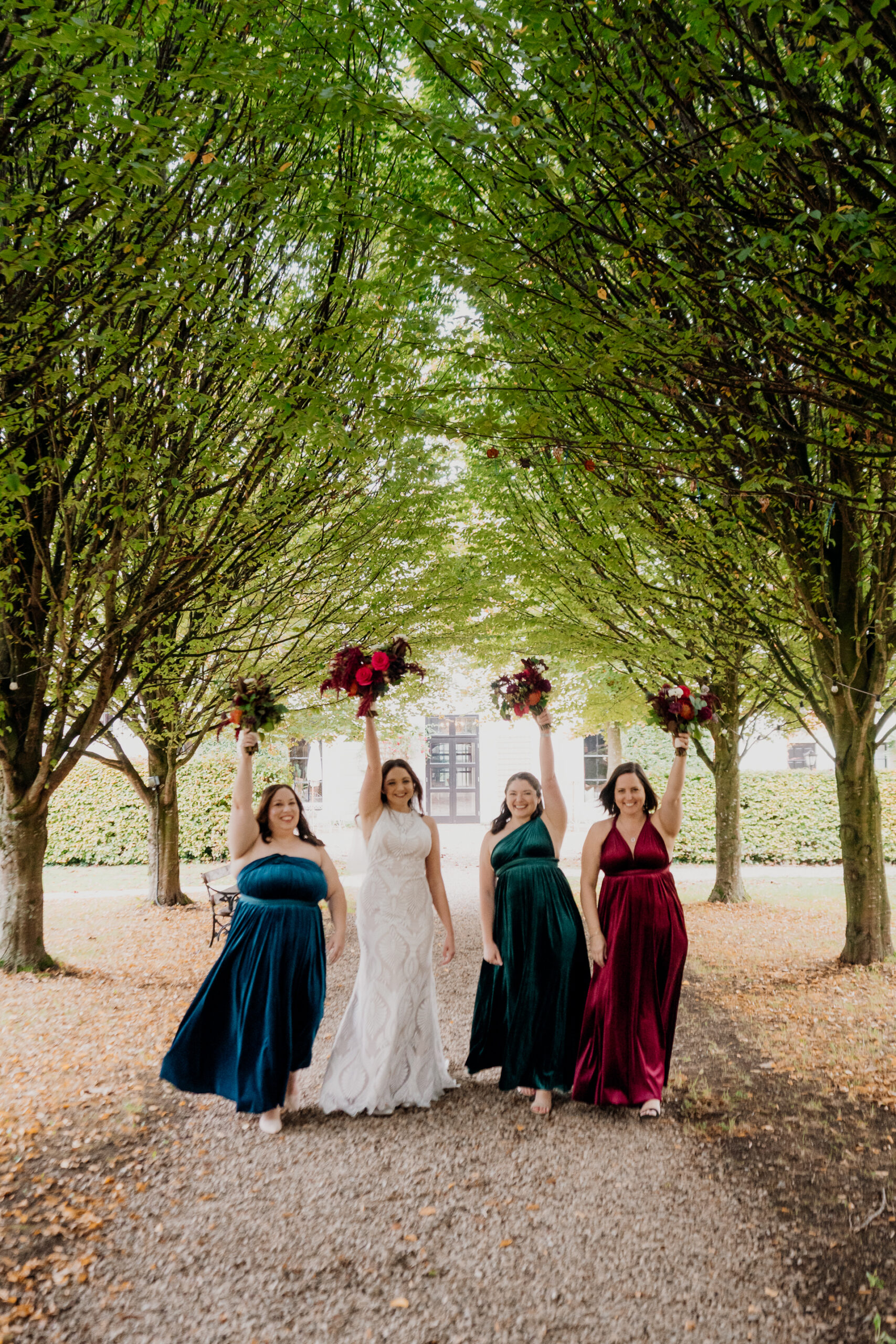 Bridesmaids enjoying a moment in the garden of Barberstown Castle.