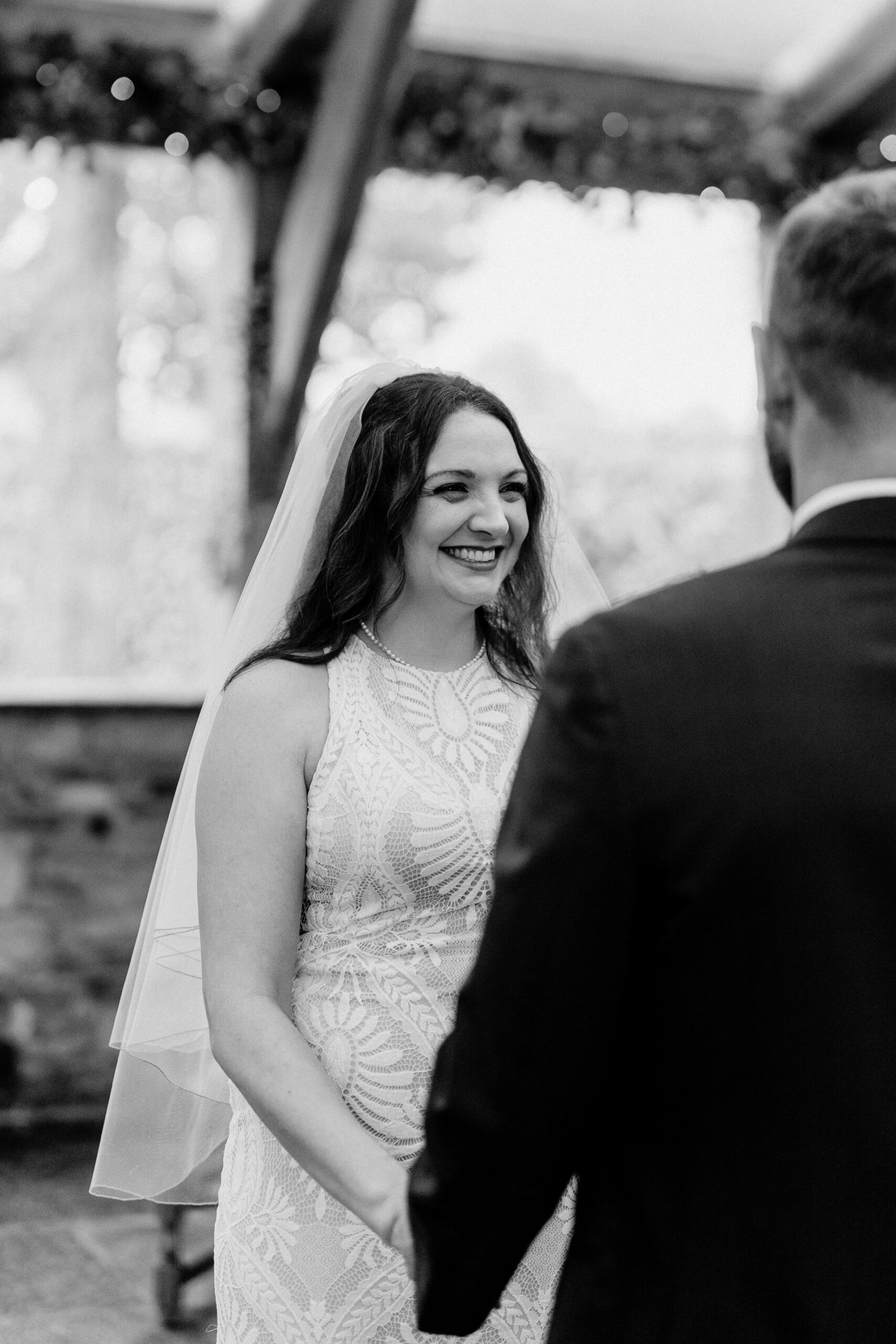 A woman in a dress smiling