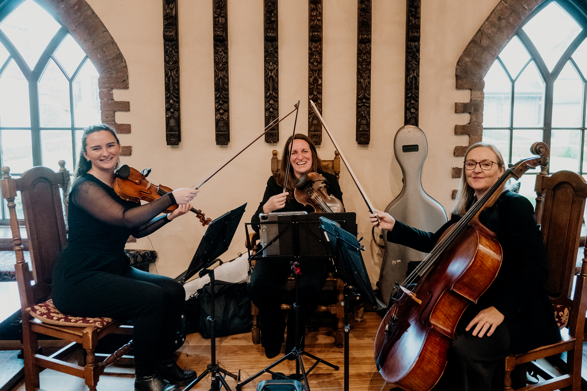 A group of women playing instruments