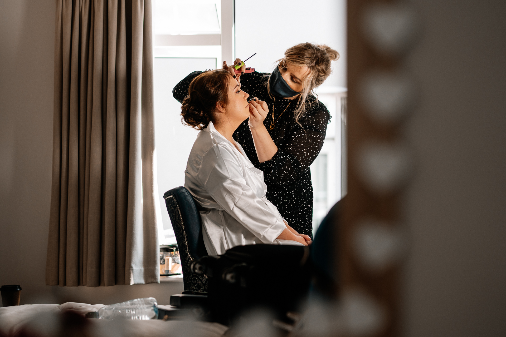 A woman getting her hair done