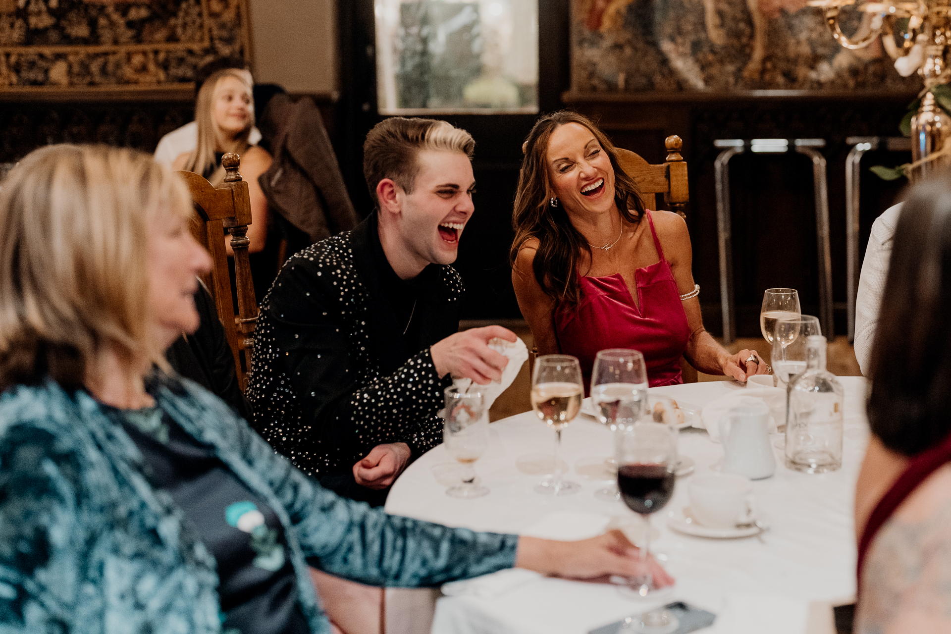 A group of people sitting around a table