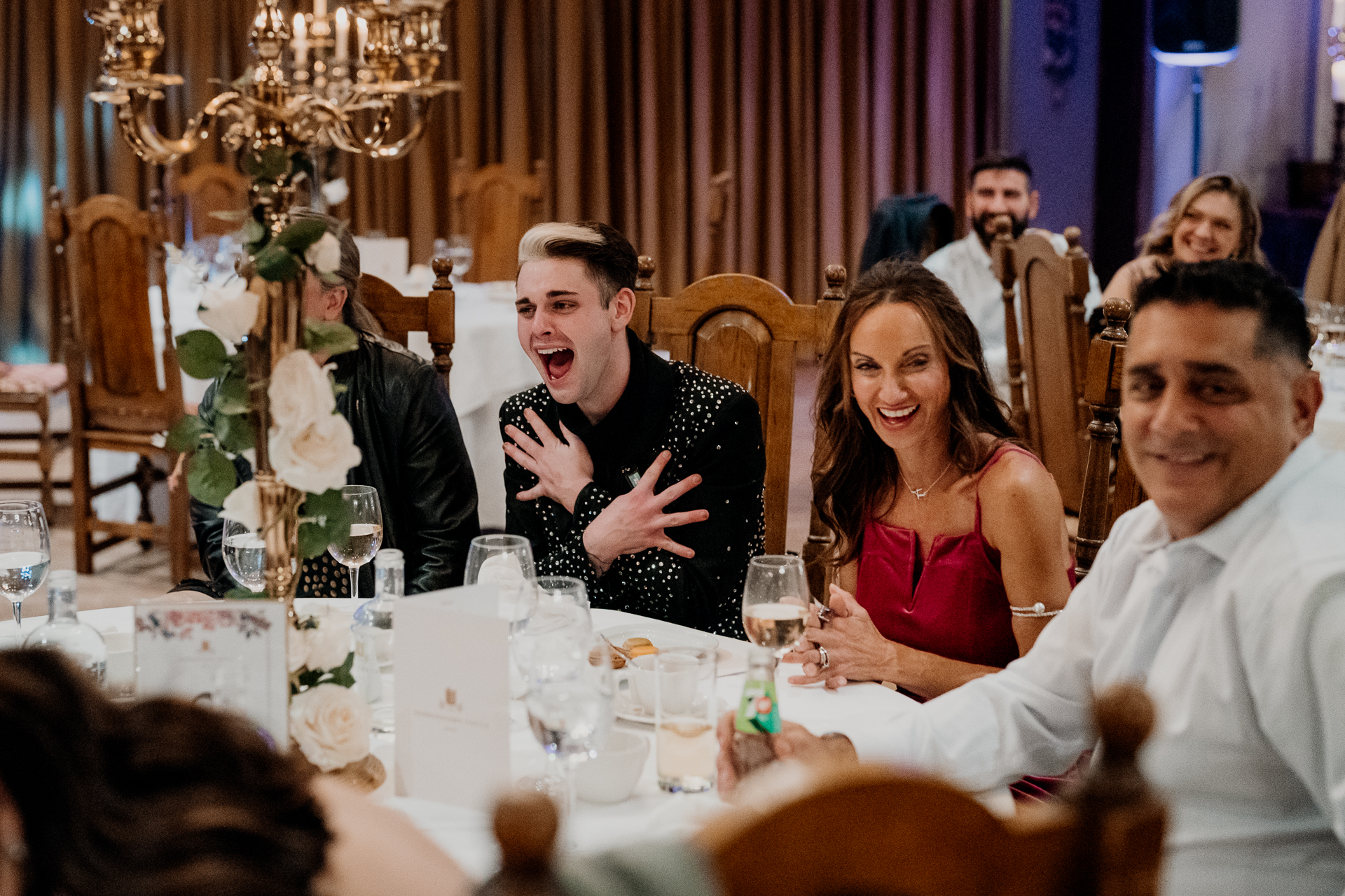 A group of people sitting at a table