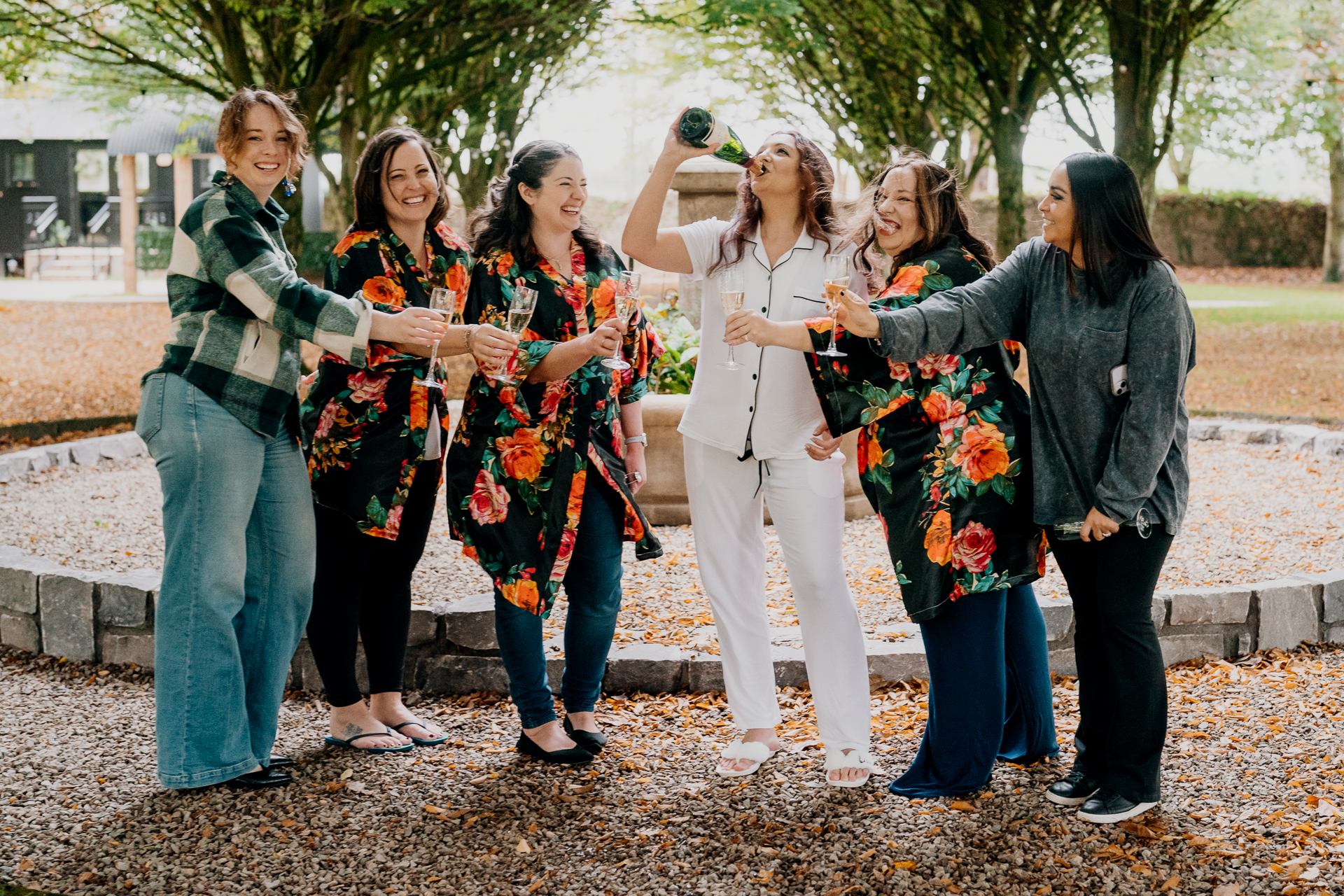 A group of people holding flowers