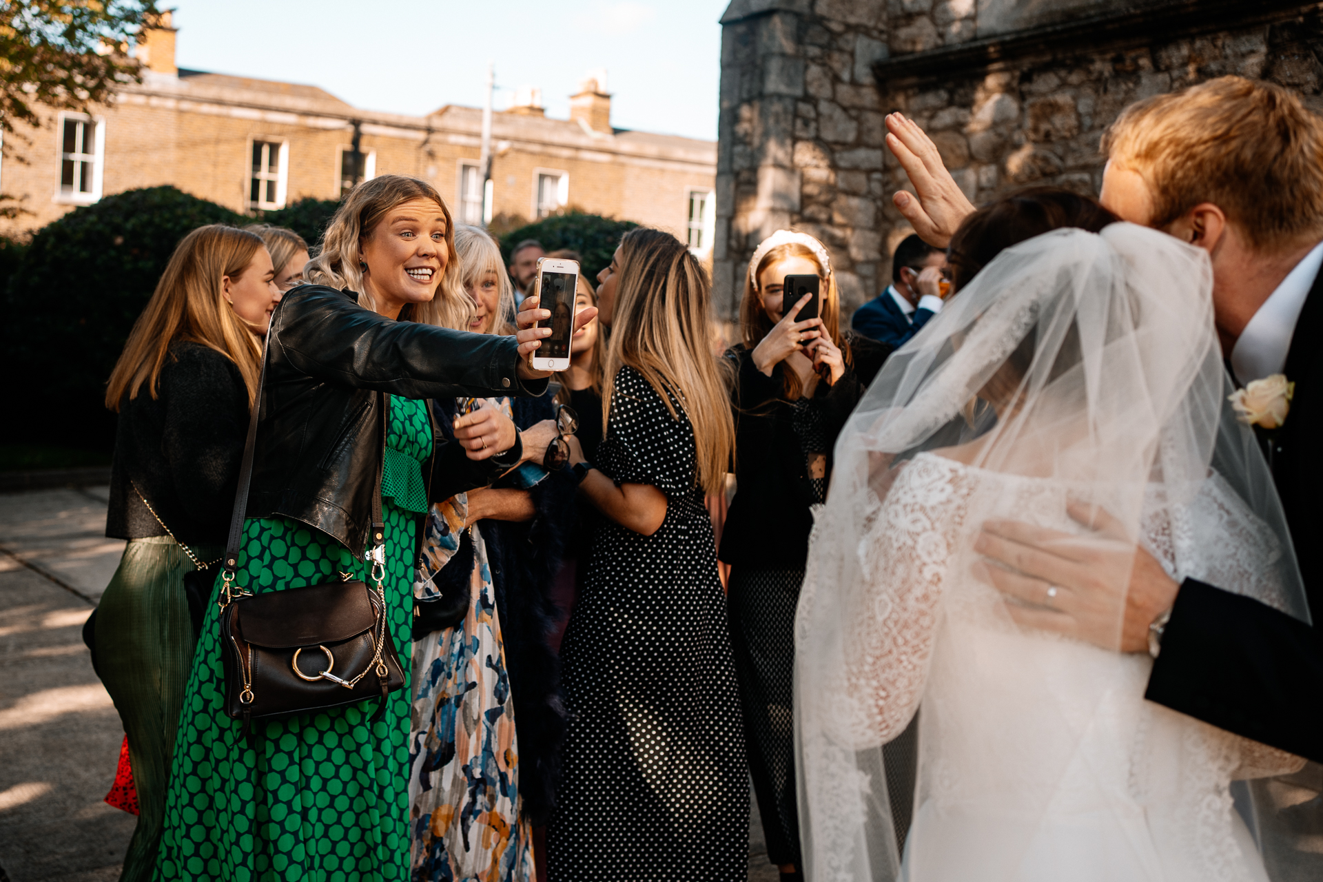 A group of people taking pictures