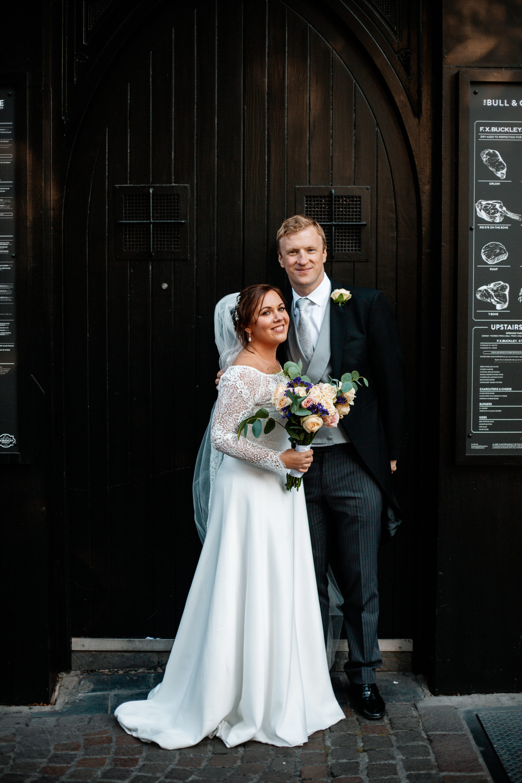 A man and woman posing for a picture