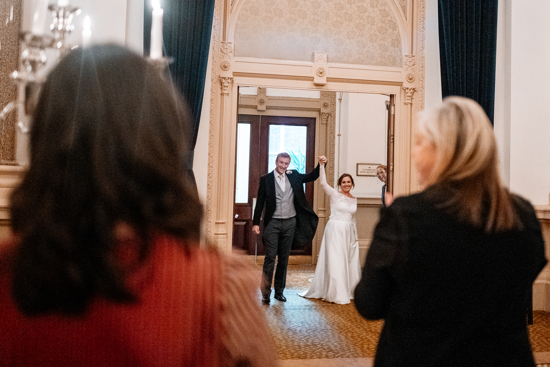 A bride and groom walking down the aisle