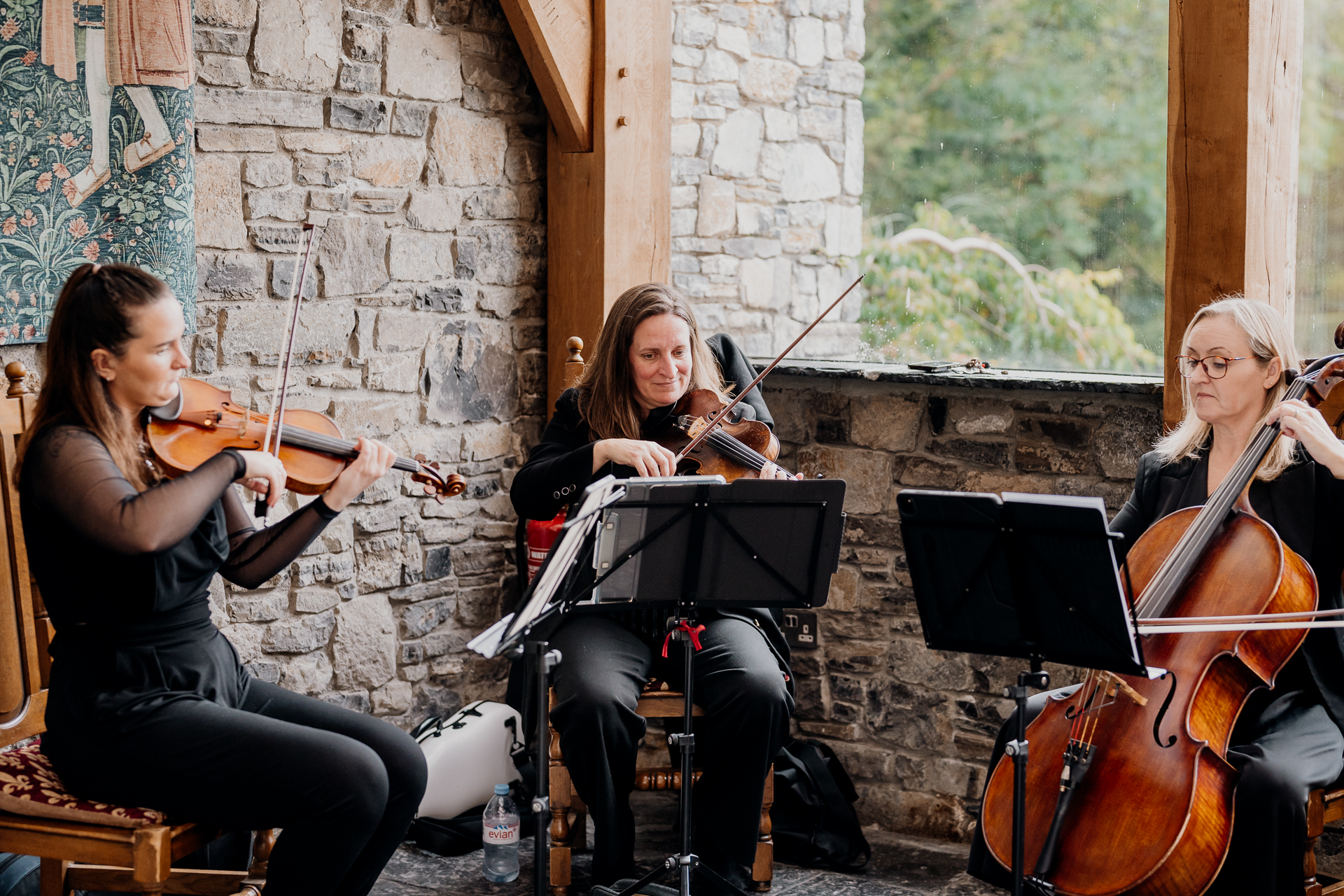 A group of women playing instruments