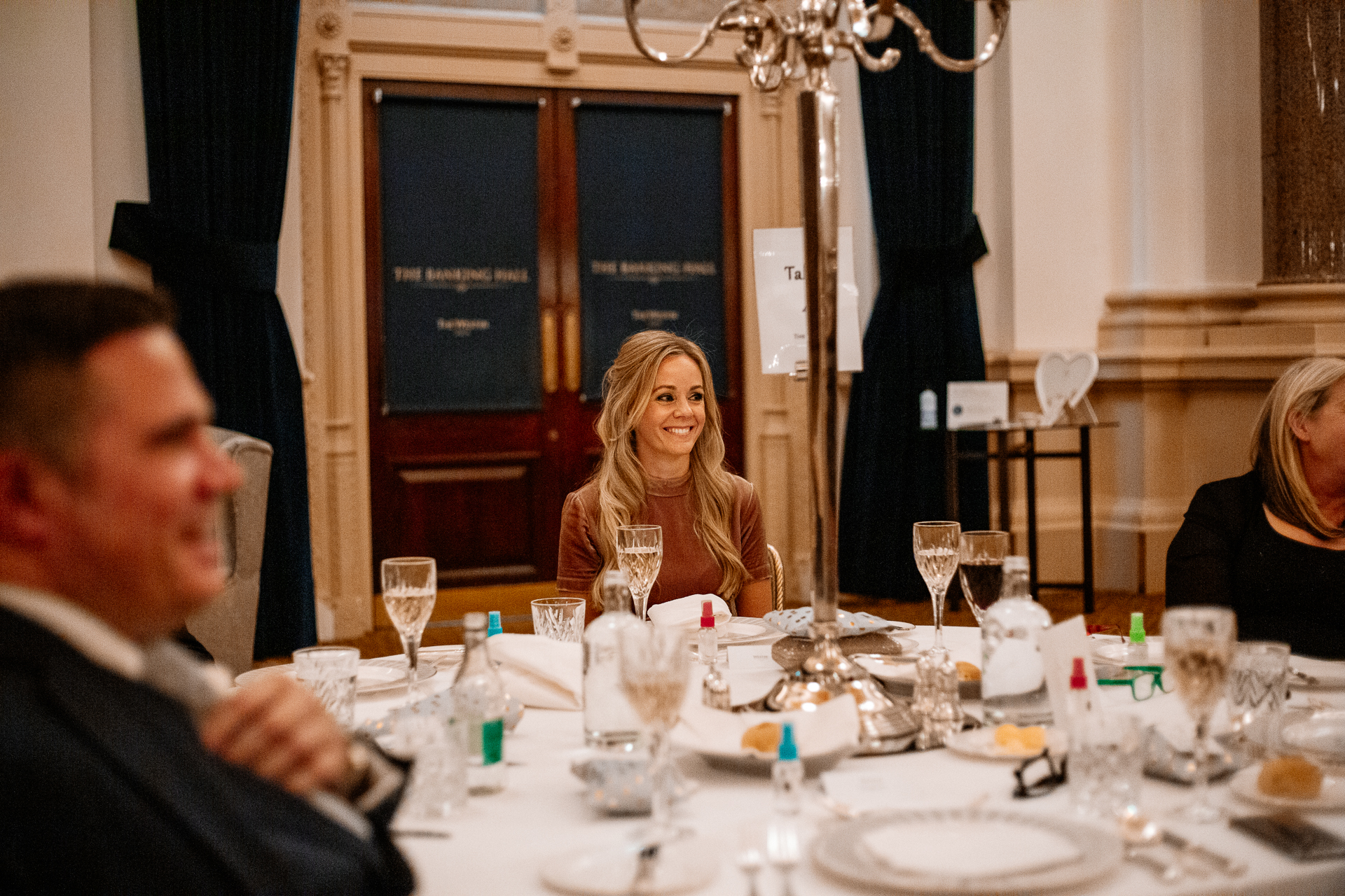 A group of people sitting around a table