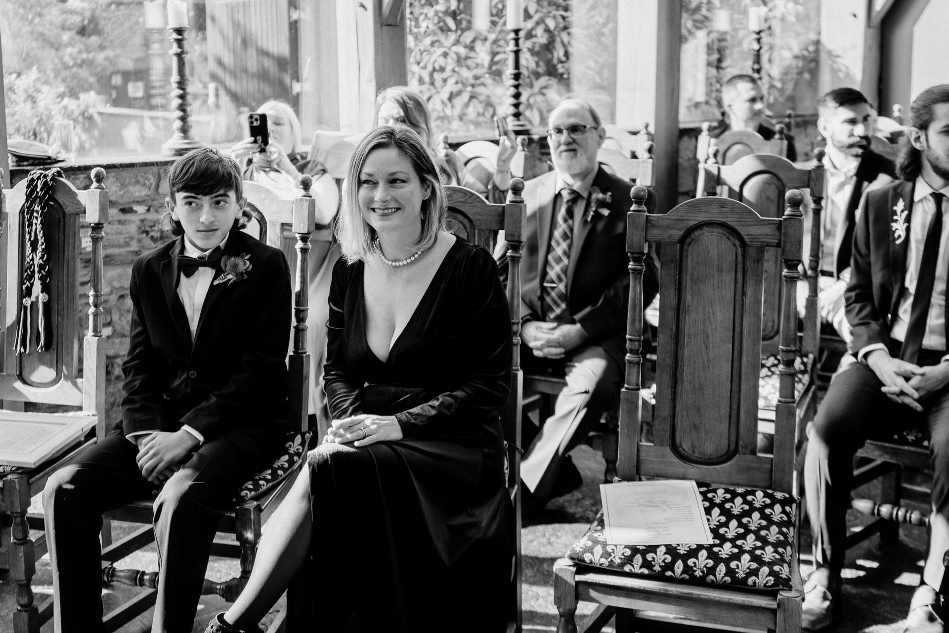 A group of people sitting in chairs