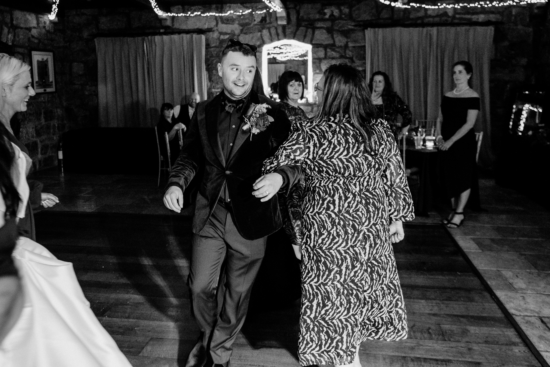 Bride and groom enjoying their first dance at Cloughan Castle, captured by Galway Wedding Photographer Wojciech Koza.