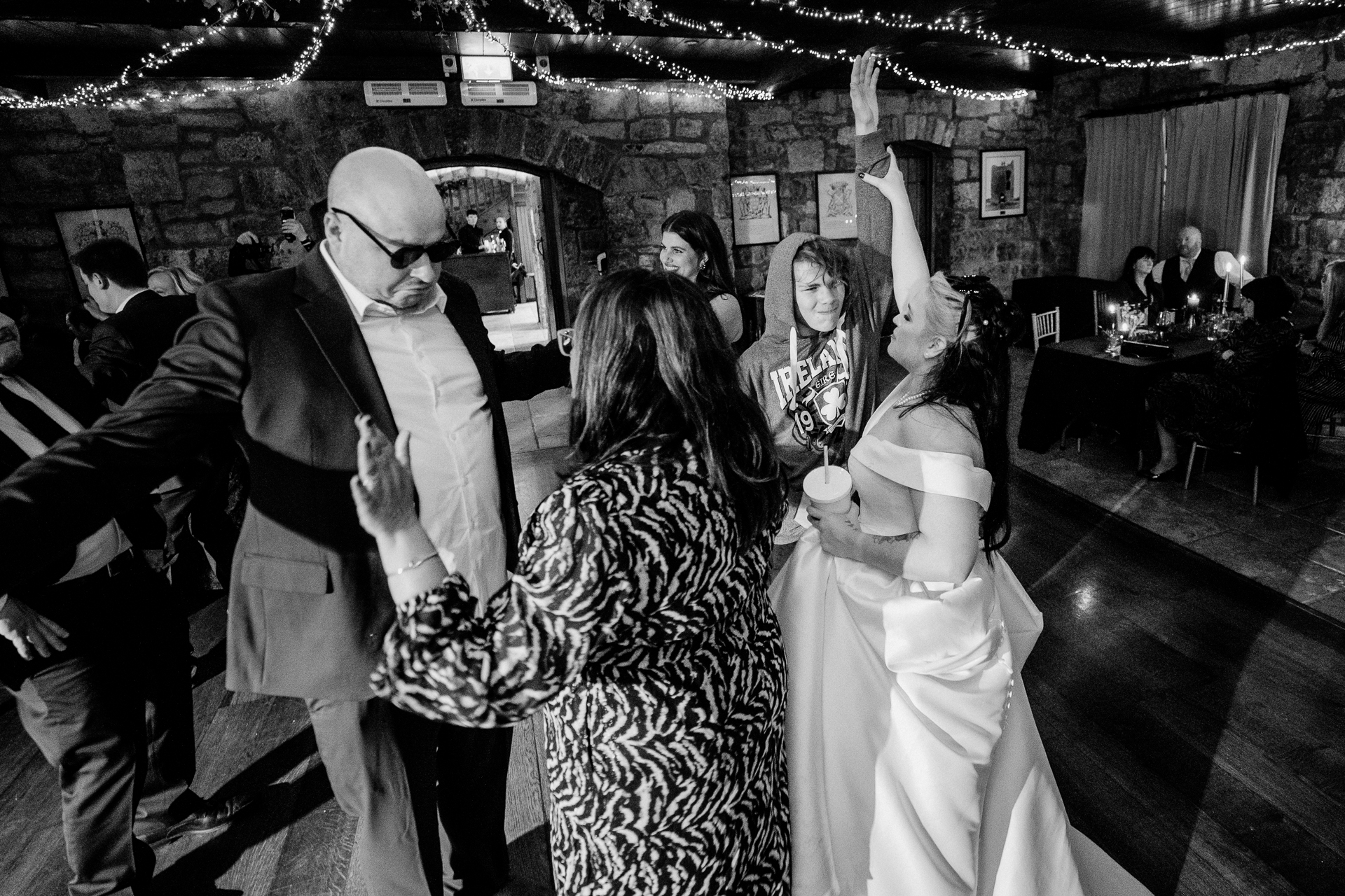 Bride and groom enjoying their first dance at Cloughan Castle, captured by Galway Wedding Photographer Wojciech Koza.