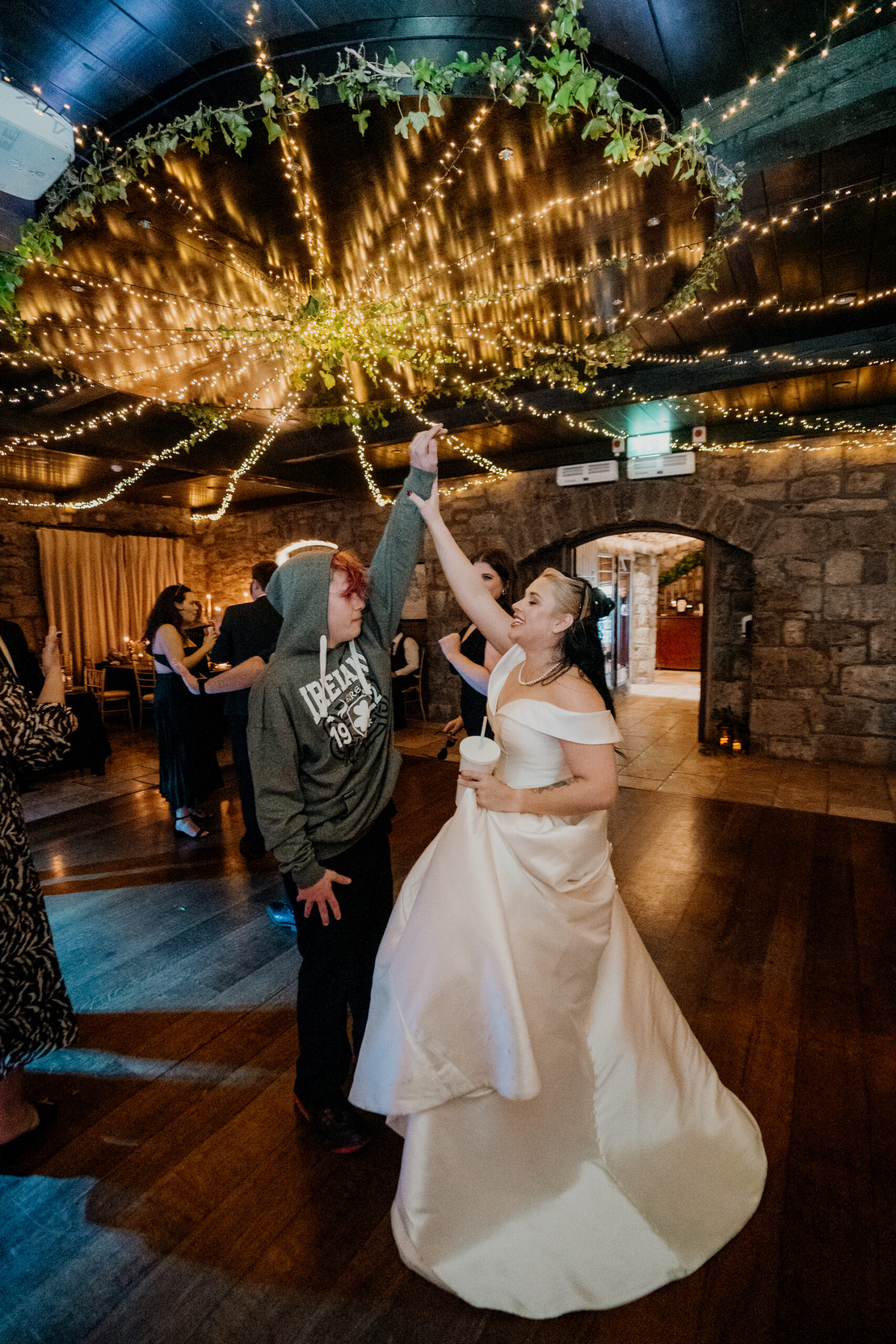 Bride and groom enjoying their first dance at Cloughan Castle, captured by Galway Wedding Photographer Wojciech Koza.