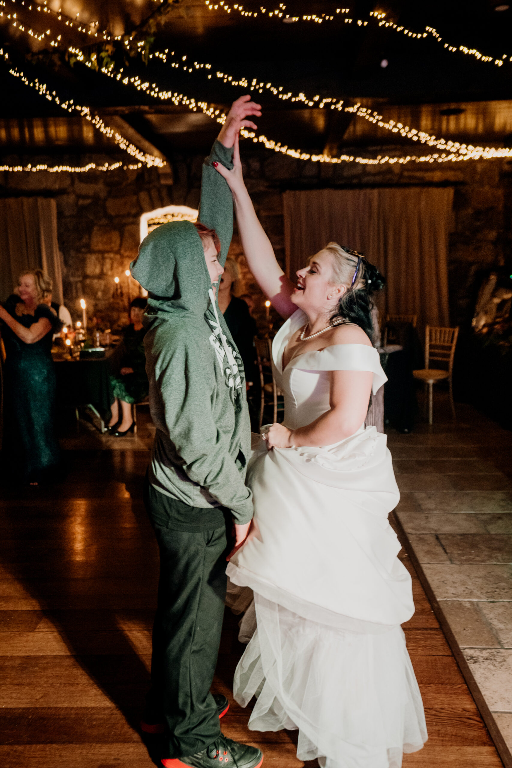 Bride and groom enjoying their first dance at Cloughan Castle, captured by Galway Wedding Photographer Wojciech Koza.