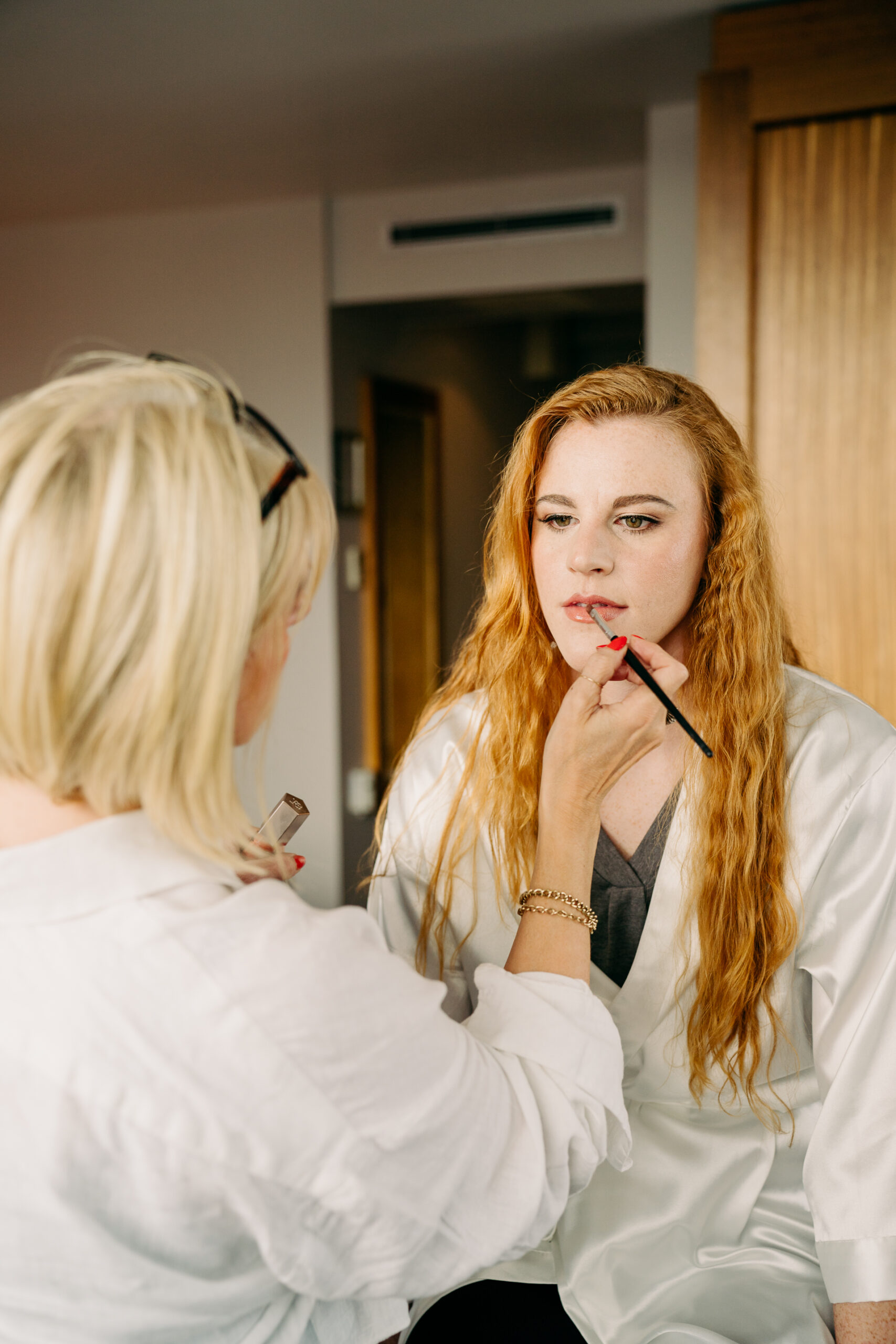 A person getting the makeup done