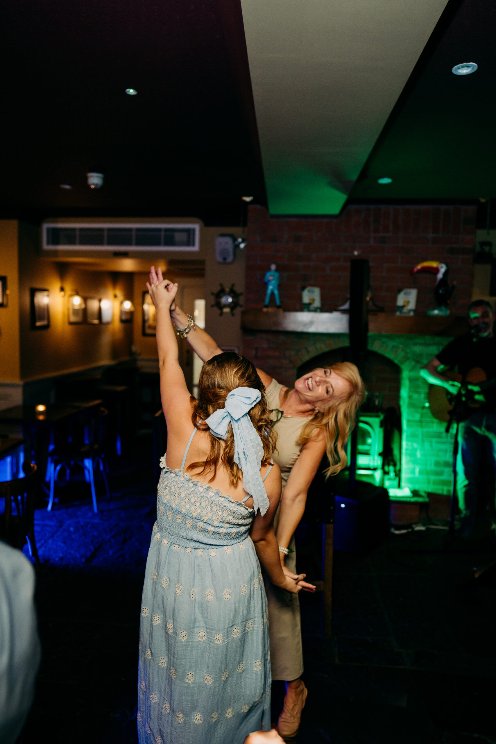 A couple of women dancing