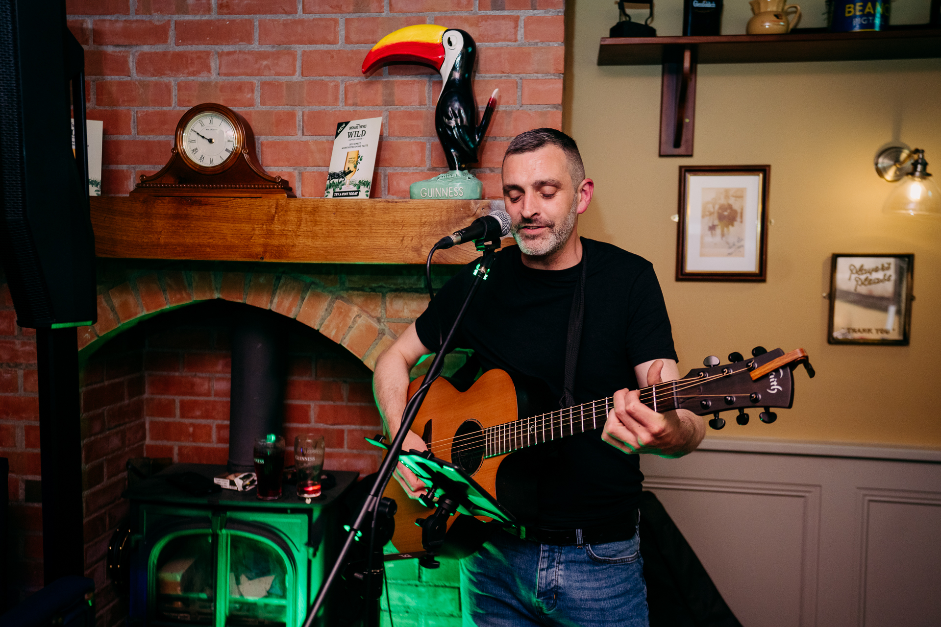 A man playing a guitar