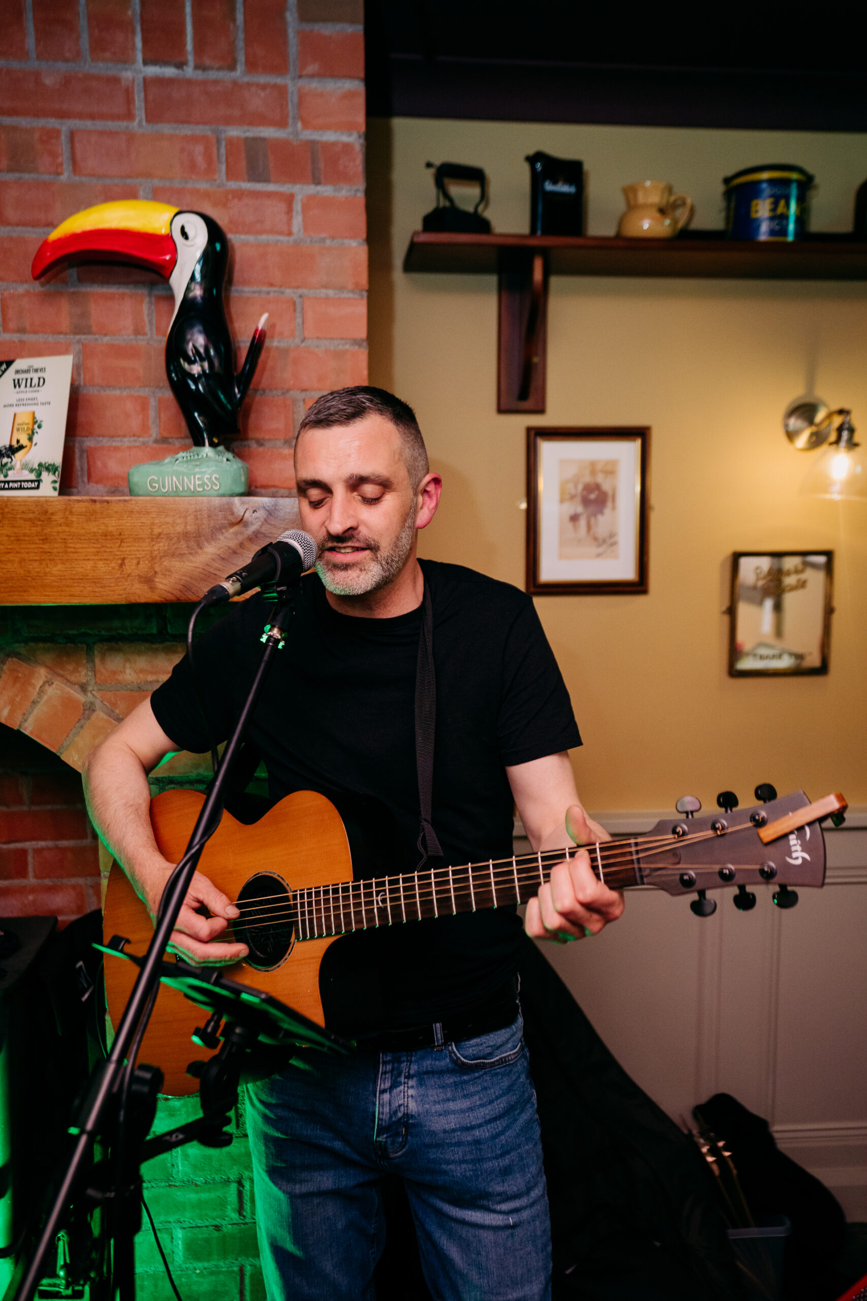 A person holding a guitar