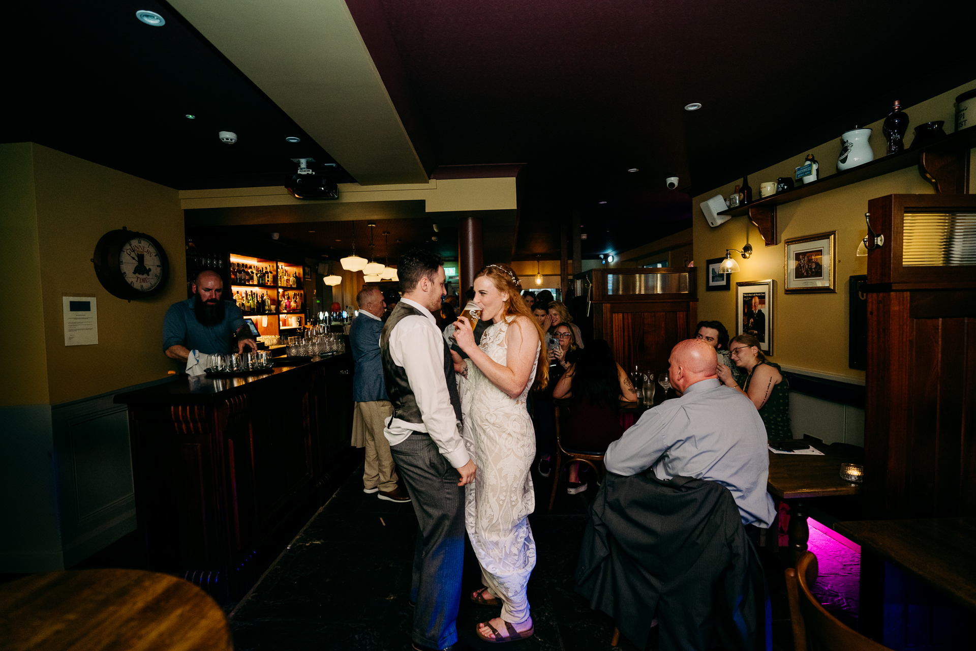 A group of people in a bar