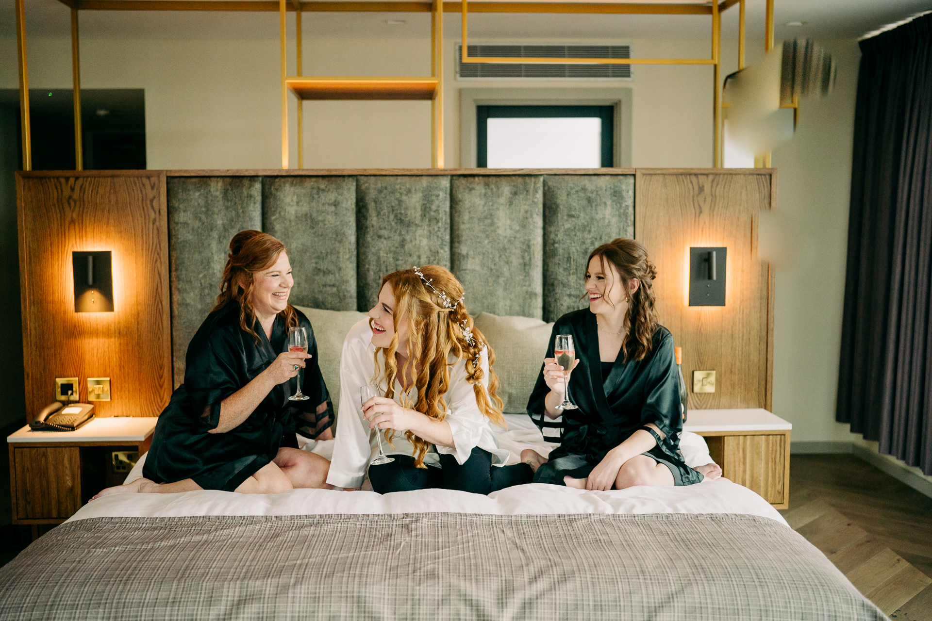 A group of women sitting on a couch