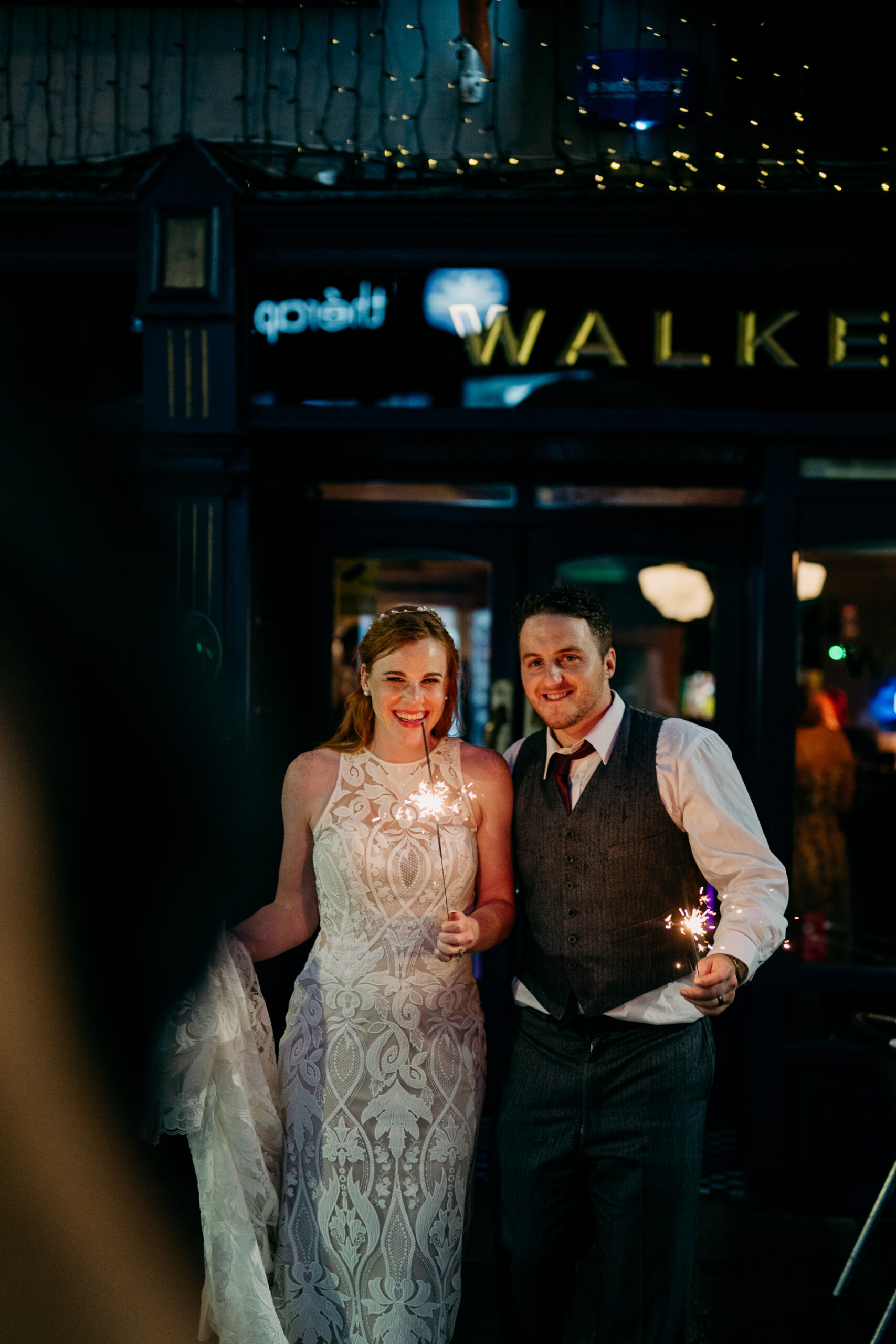 A man and woman posing for a picture