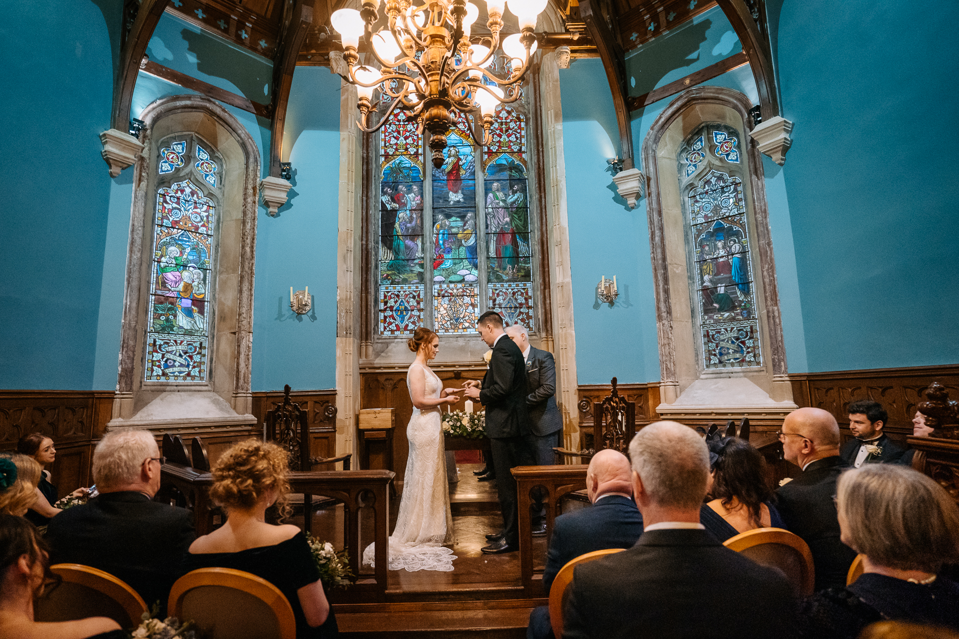 A bride and groom dancing in a church