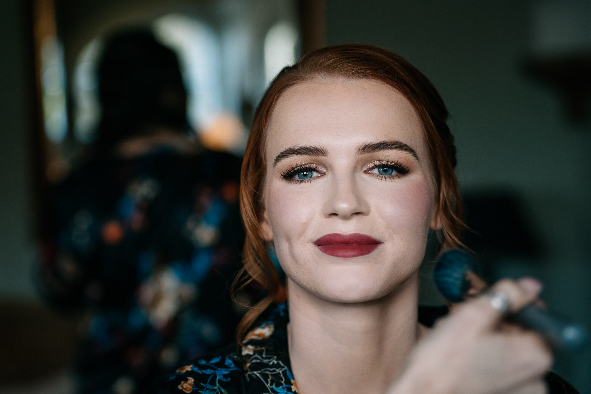 A woman with red hair