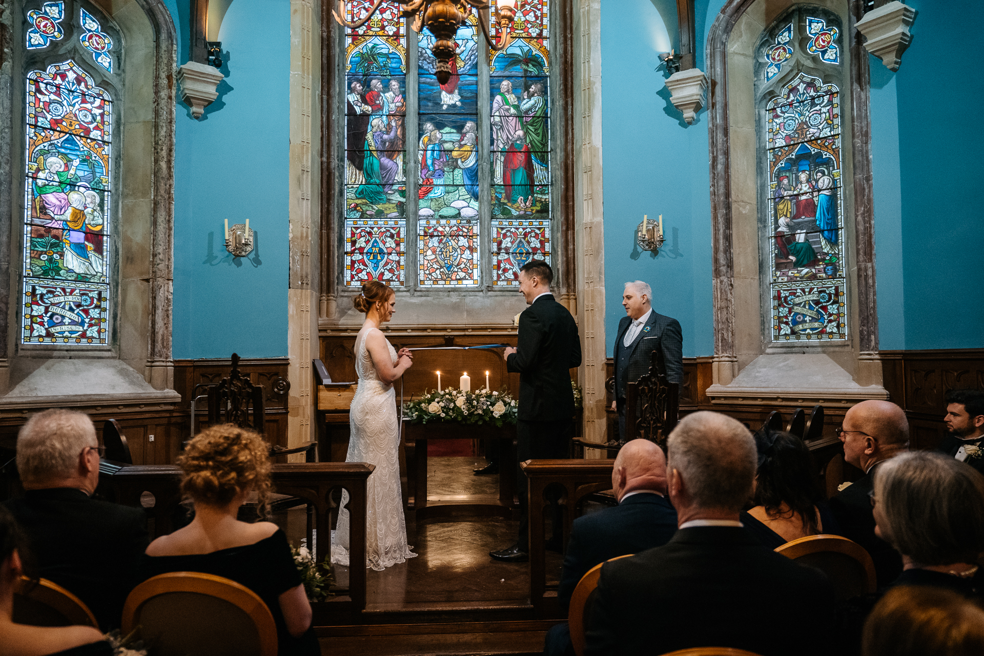 A bride and groom walking down the aisle