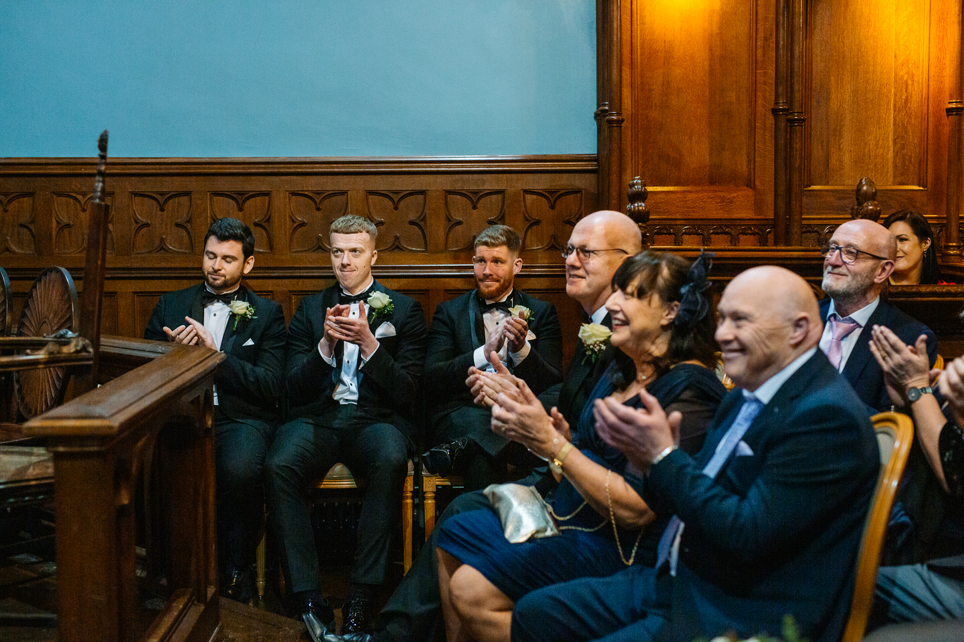 A group of people sitting in chairs