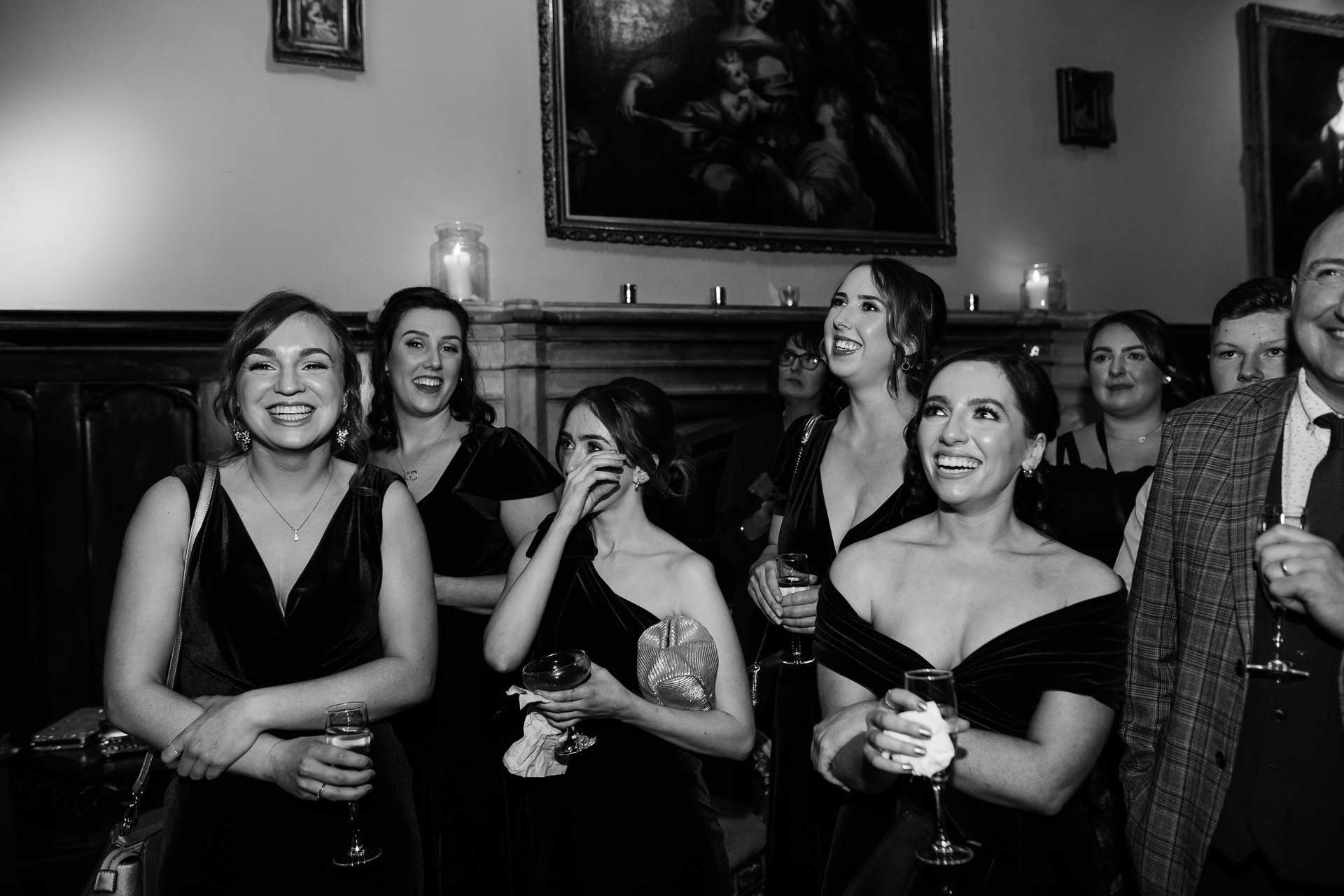 A group of women holding wine glasses