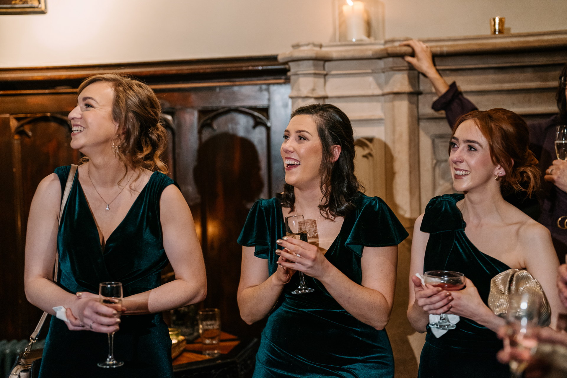 A group of women holding wine glasses