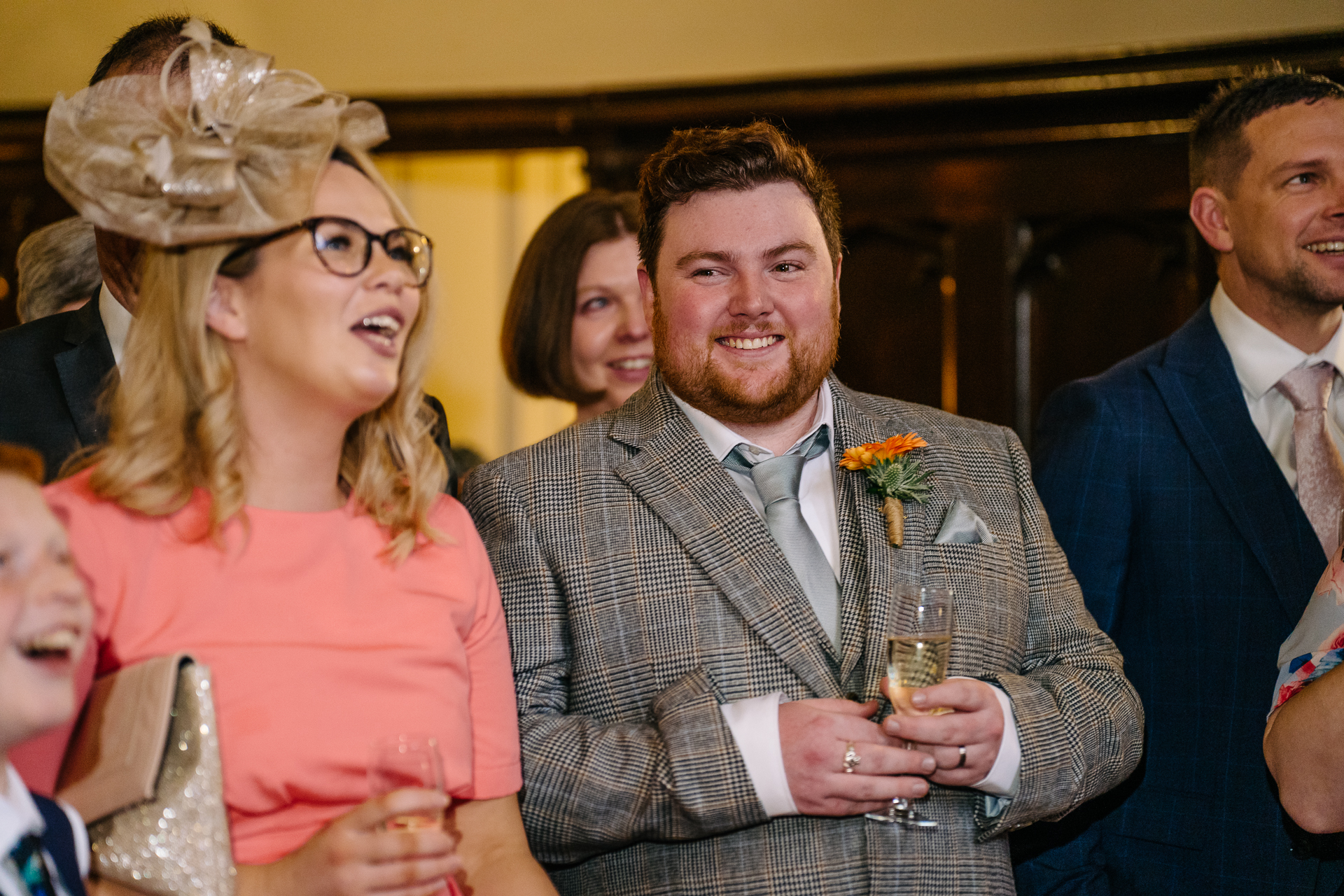 Wedding speeches during a same-sex wedding reception at Markree Castle, Ireland, featuring emotional and joyful moments shared by family and friends