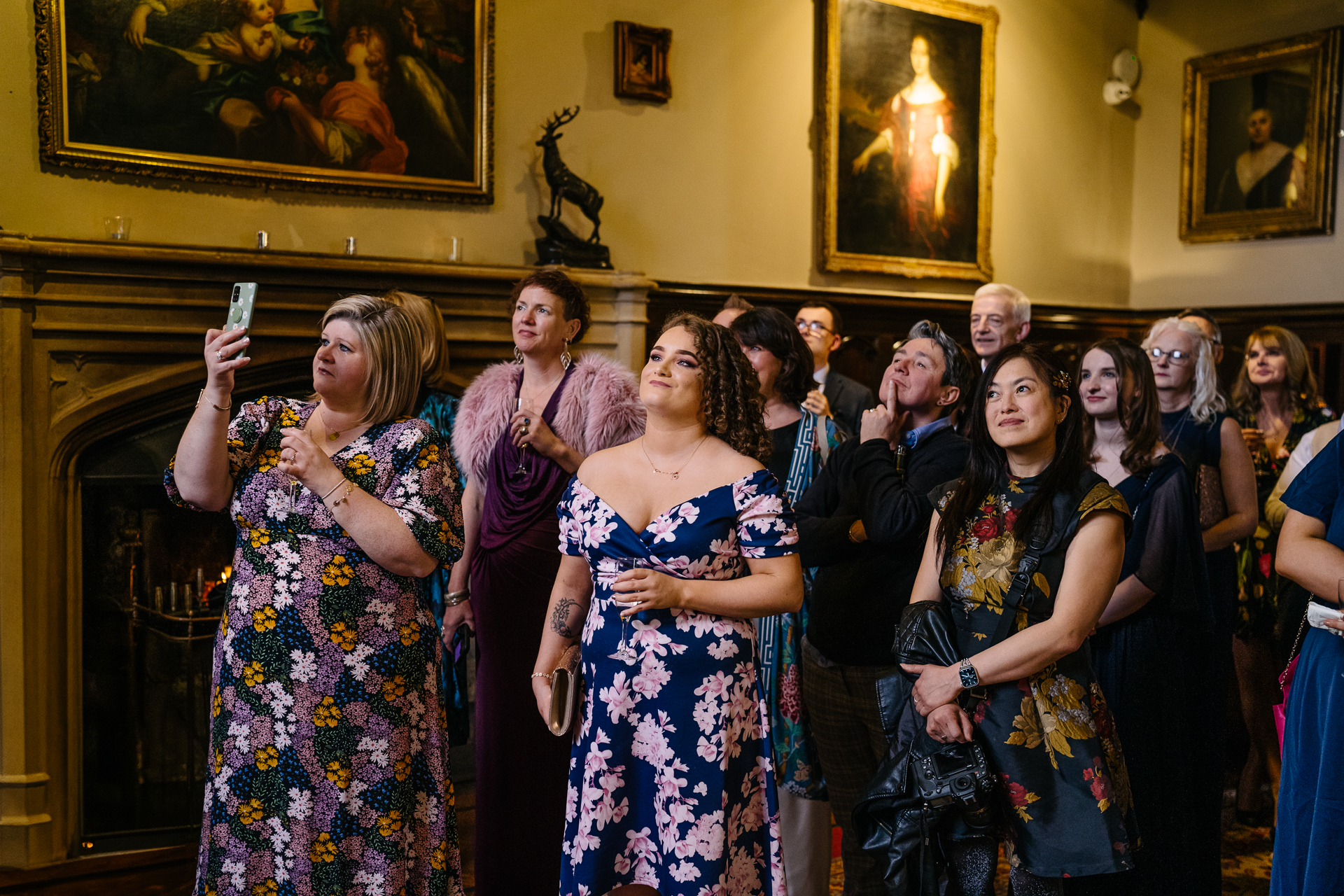 Wedding speeches during a same-sex wedding reception at Markree Castle, Ireland, featuring emotional and joyful moments shared by family and friends