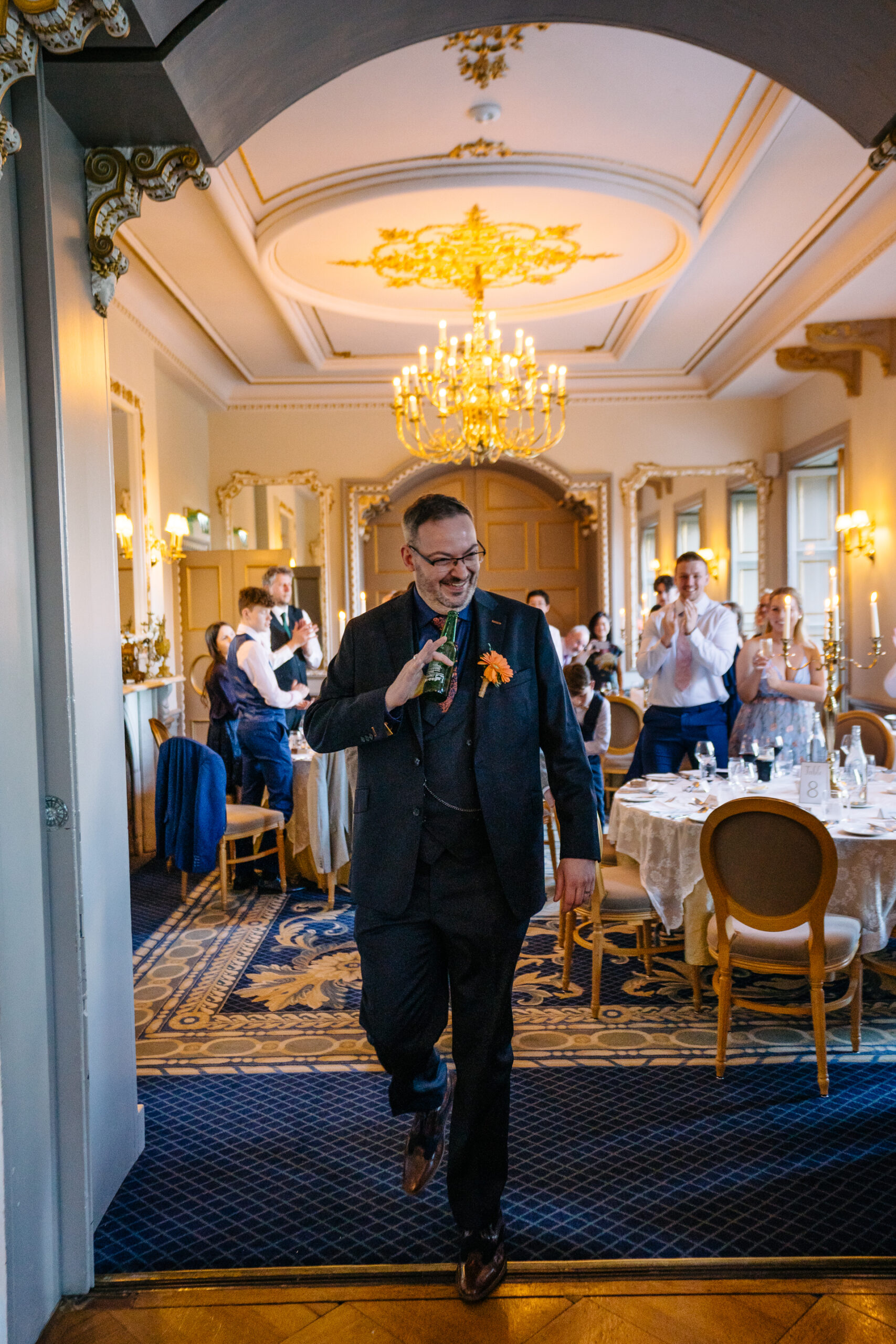 Wedding speeches during a same-sex wedding reception at Markree Castle, Ireland, featuring emotional and joyful moments shared by family and friends