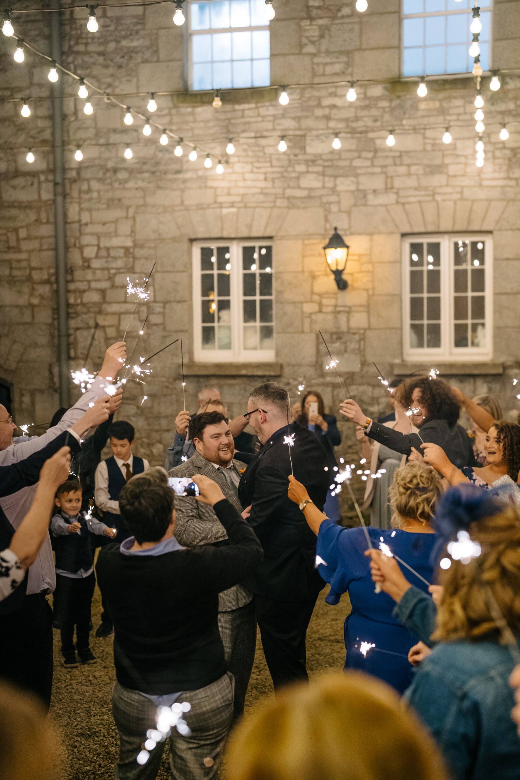 Two grooms sharing their romantic first dance, followed by a lively wedding party at Markree Castle, Ireland