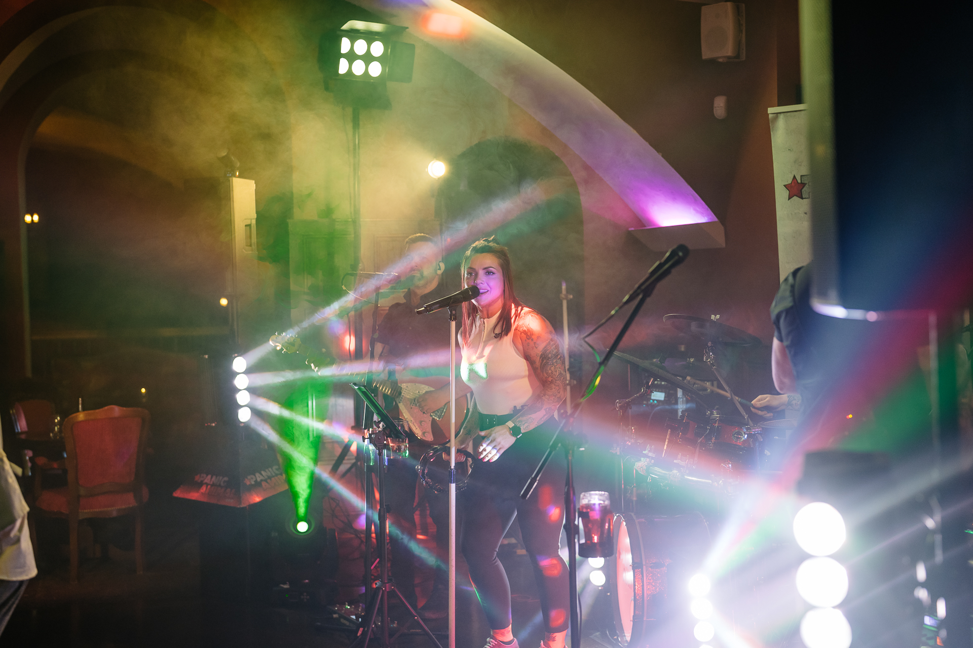 A live band performing during the LGBT wedding reception at Markree Castle, Ireland, creating a vibrant and joyful atmosphere.