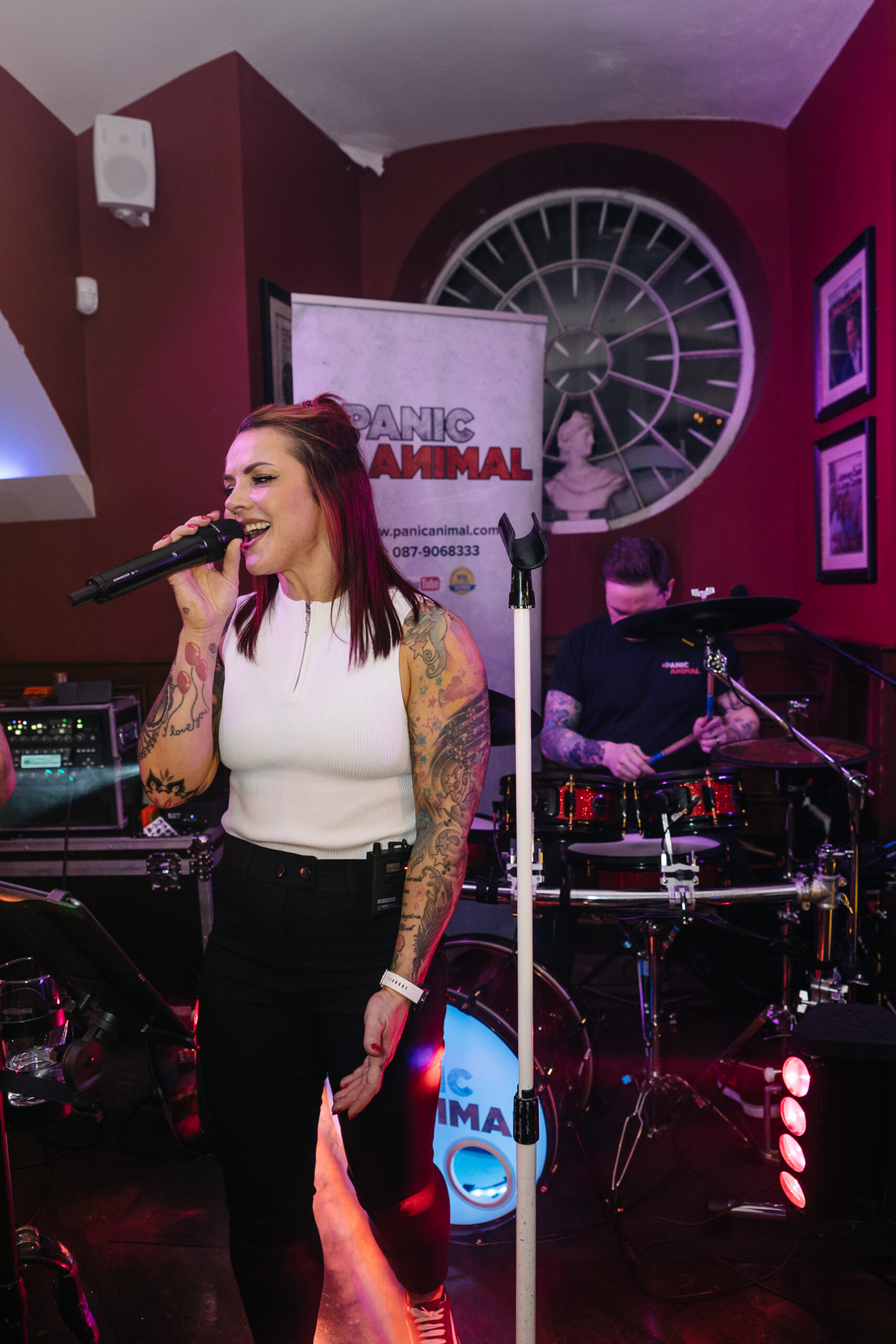 A live band performing during the LGBT wedding reception at Markree Castle, Ireland, creating a vibrant and joyful atmosphere.