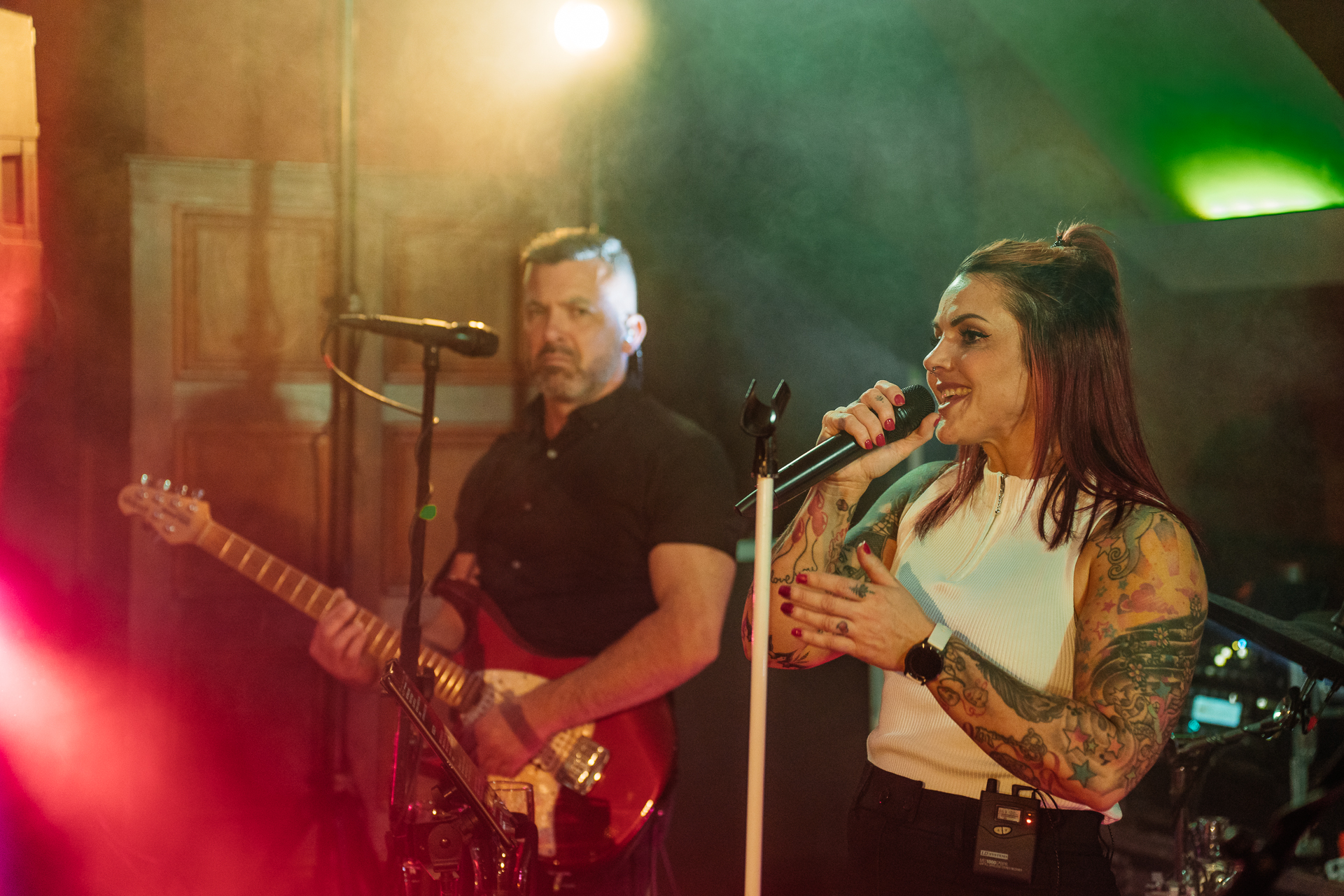 A live band performing during the LGBT wedding reception at Markree Castle, Ireland, creating a vibrant and joyful atmosphere.