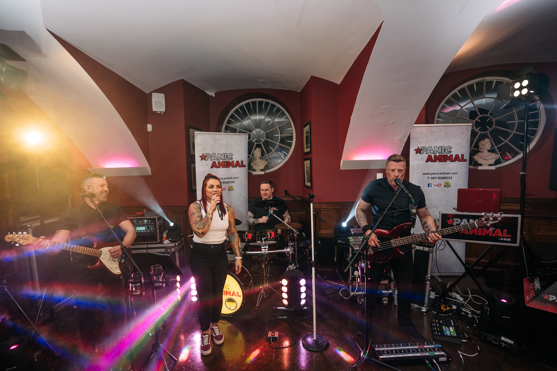 A live band performing during the LGBT wedding reception at Markree Castle, Ireland, creating a vibrant and joyful atmosphere.