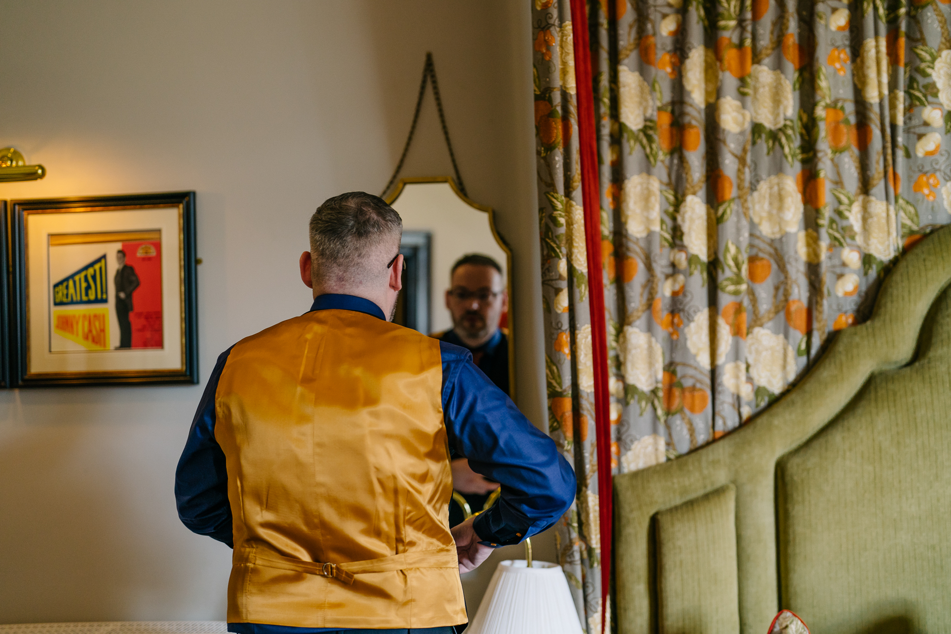 Two grooms preparing for their LGBT wedding in the bridal suite at Markree Castle, featuring elegant wedding details." "A groom adjusting his tie in the luxurious suite of Markree Castle." "Wedding details, including cufflinks and shoes, during the preparation of two grooms at Markree Castle"A groom adjusting his tie in the luxurious suite of Markree Castle." "Wedding details, including cufflinks and shoes, during the preparation of two grooms at Markree Castle