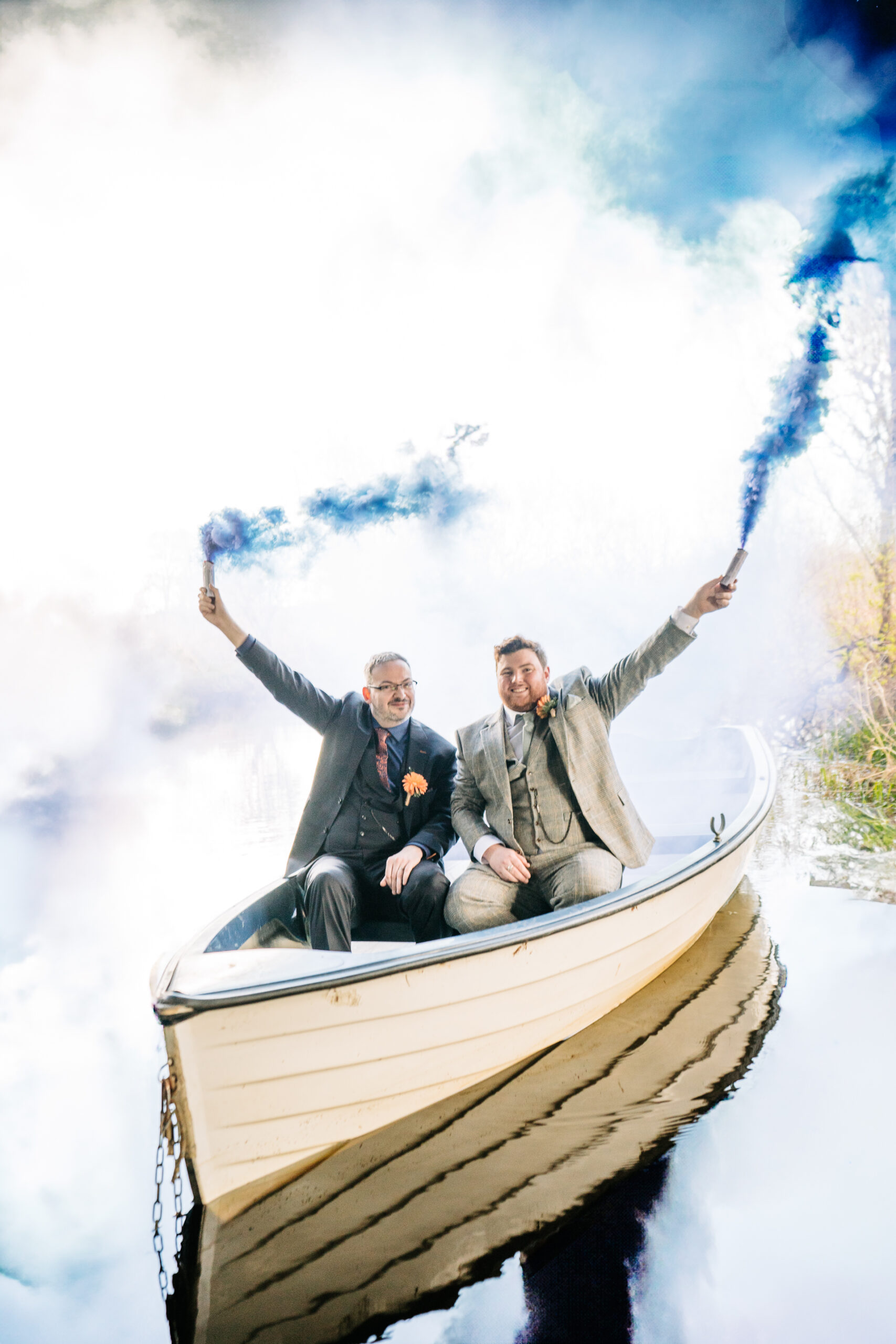 Two grooms posing for romantic wedding portraits in the gardens of Markree Castle