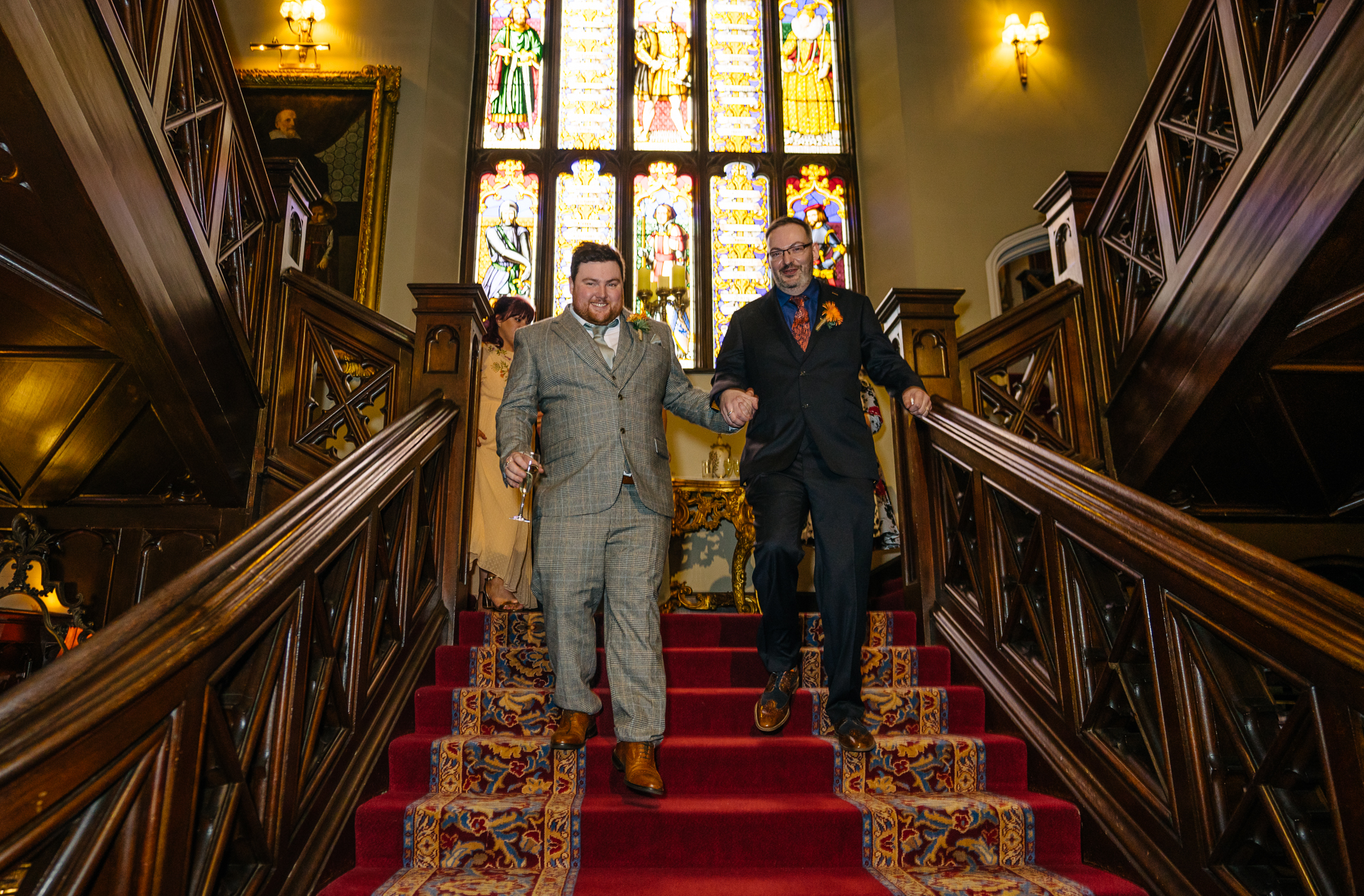 Candid wedding portraits of two grooms captured in the historic surroundings of Markree Castle