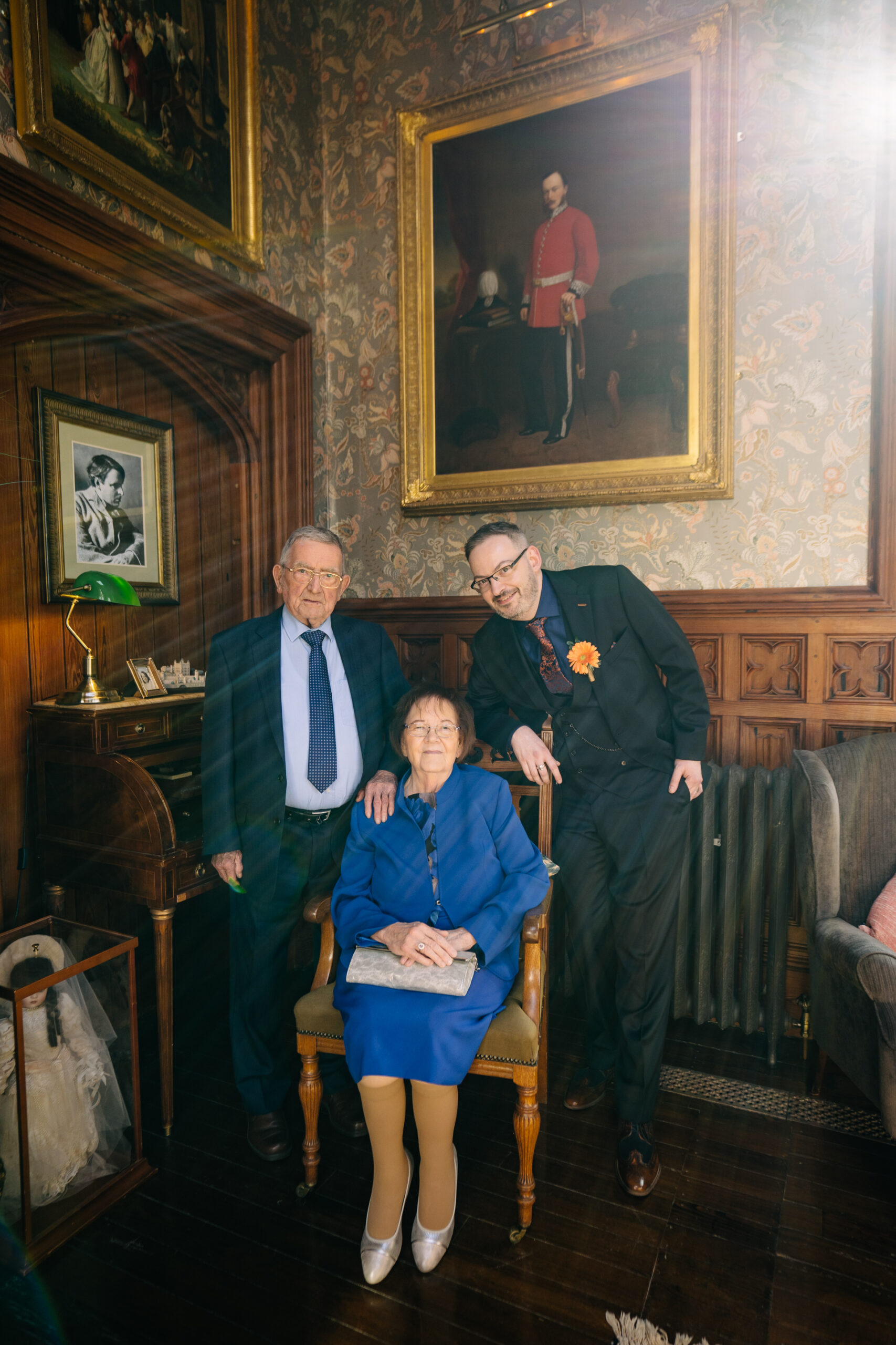 Two grooms enjoying their wedding reception at Markree Castle’s grand hall