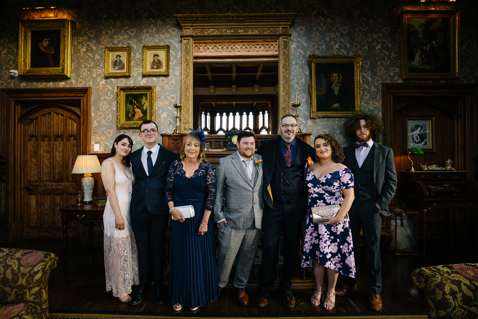 Two grooms enjoying their wedding reception at Markree Castle’s grand hall