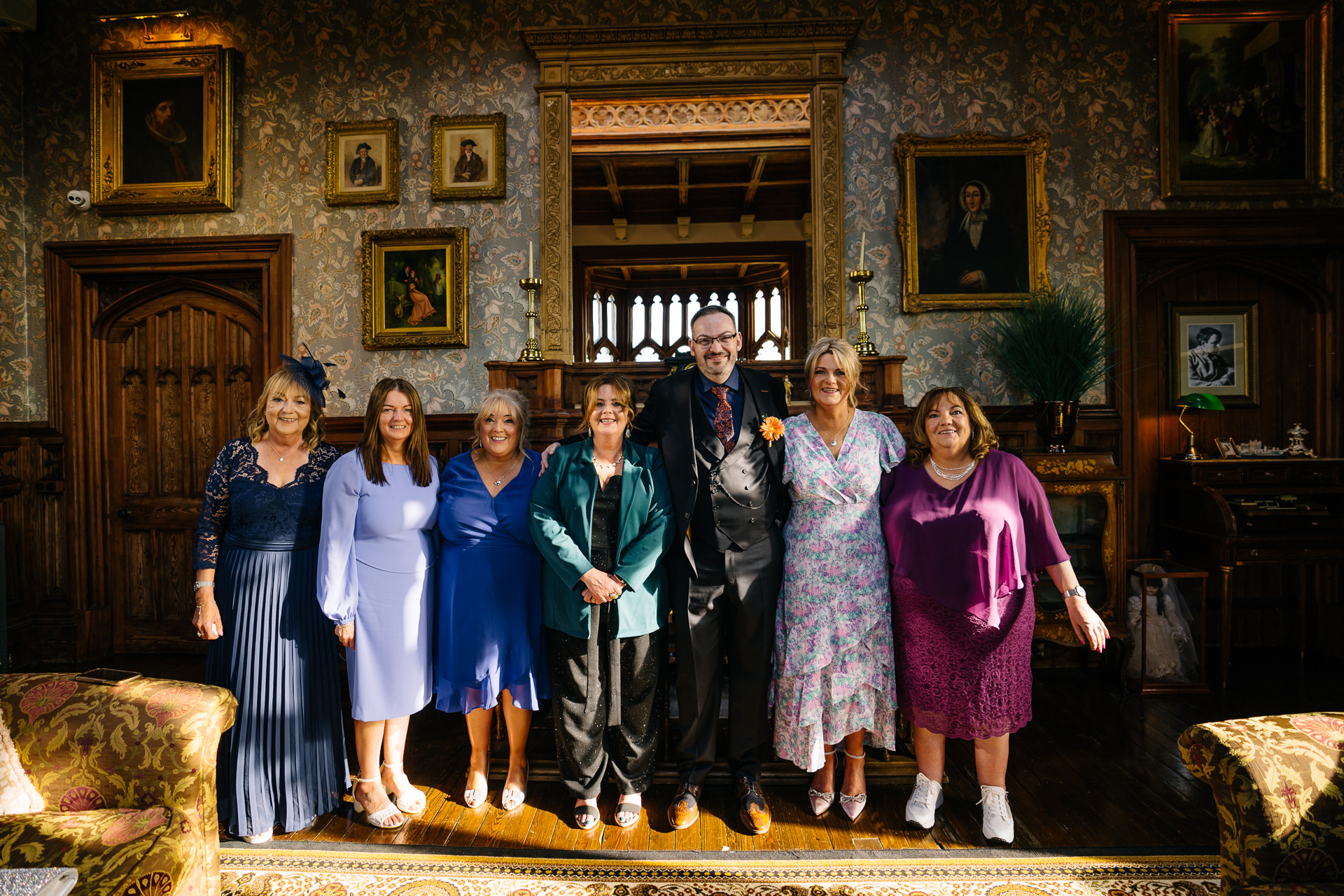 Two grooms enjoying their wedding reception at Markree Castle’s grand hall