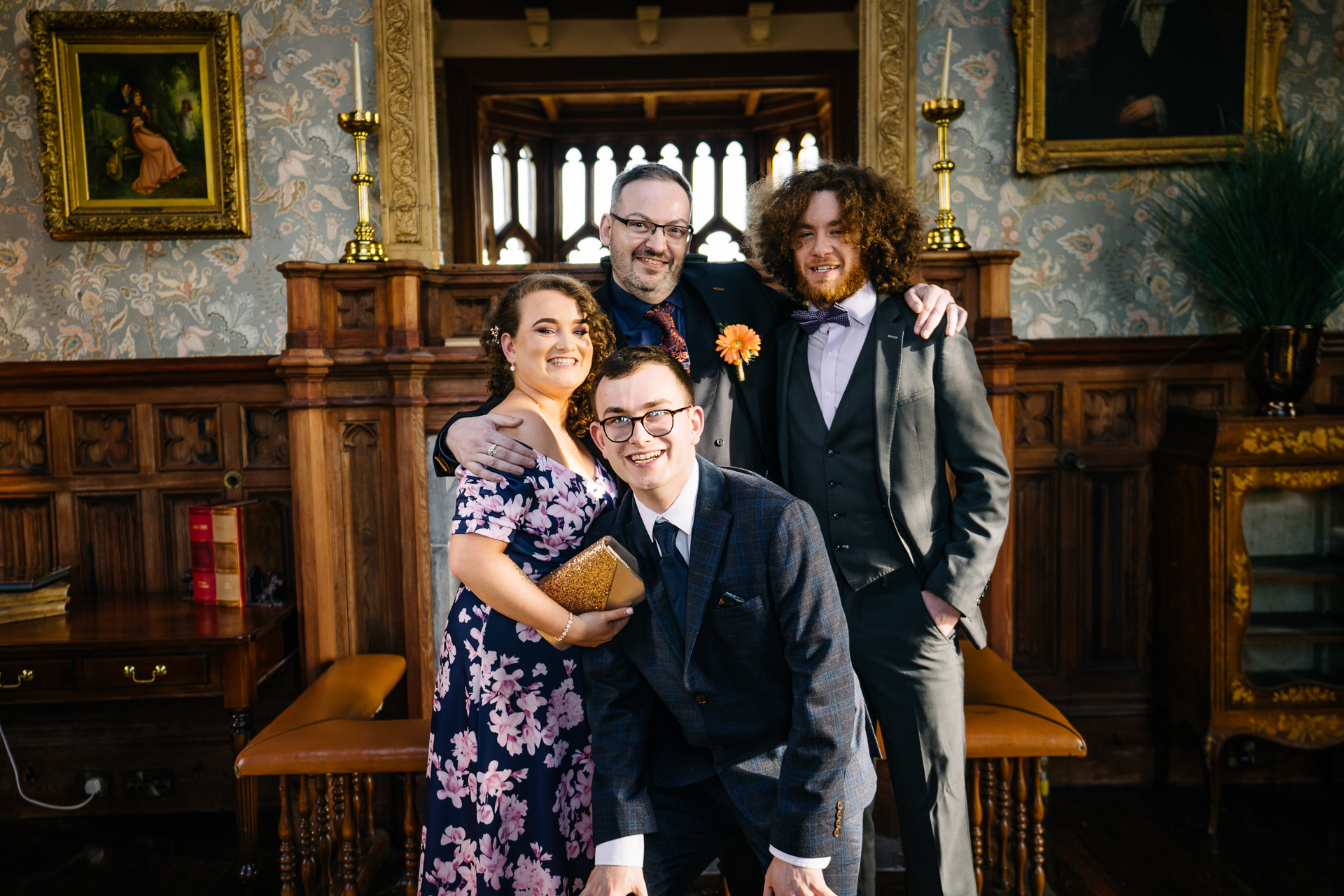 Two grooms enjoying their wedding reception at Markree Castle’s grand hall