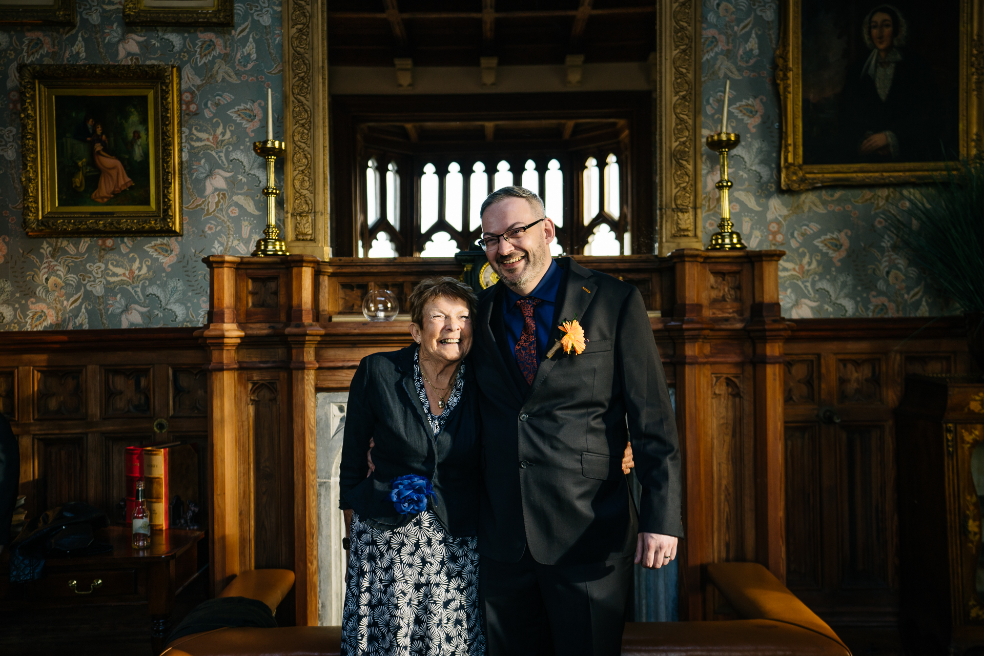 Two grooms enjoying their wedding reception at Markree Castle’s grand hall