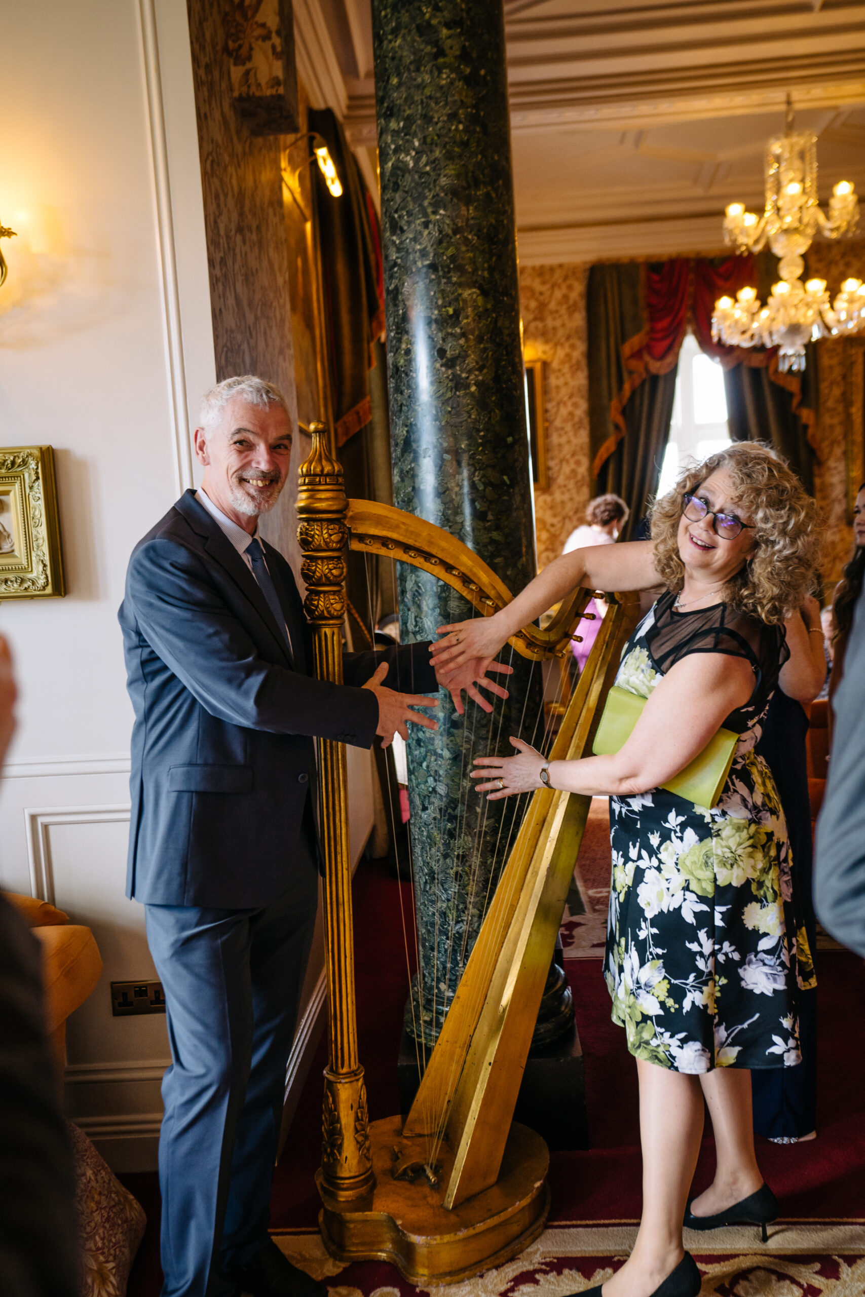 Guests raising a toast during the wedding reception at Markree Castle