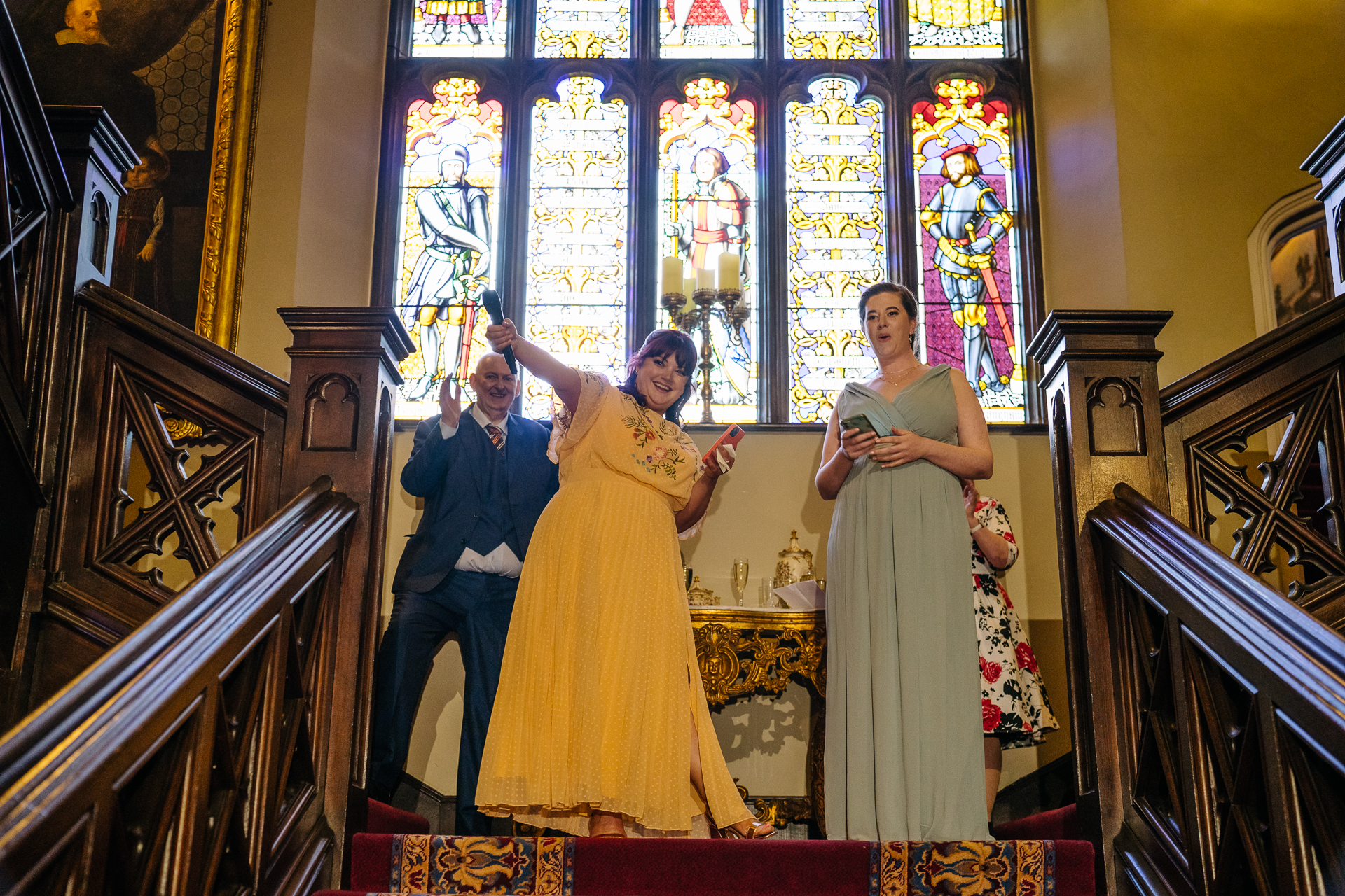 Wedding speeches during a same-sex wedding reception at Markree Castle, Ireland, featuring emotional and joyful moments shared by family and friends